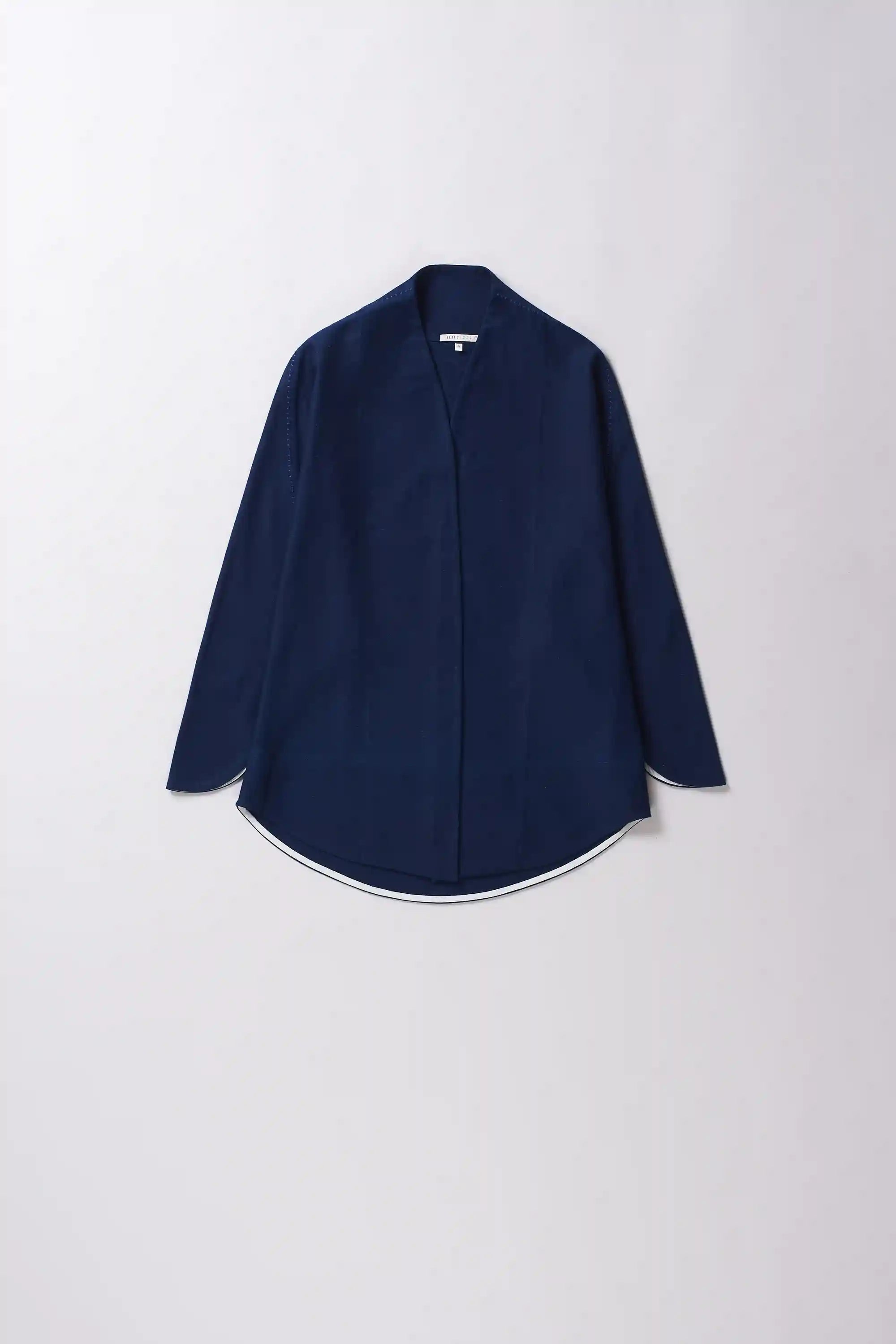 Front image of denim shrug in indigo