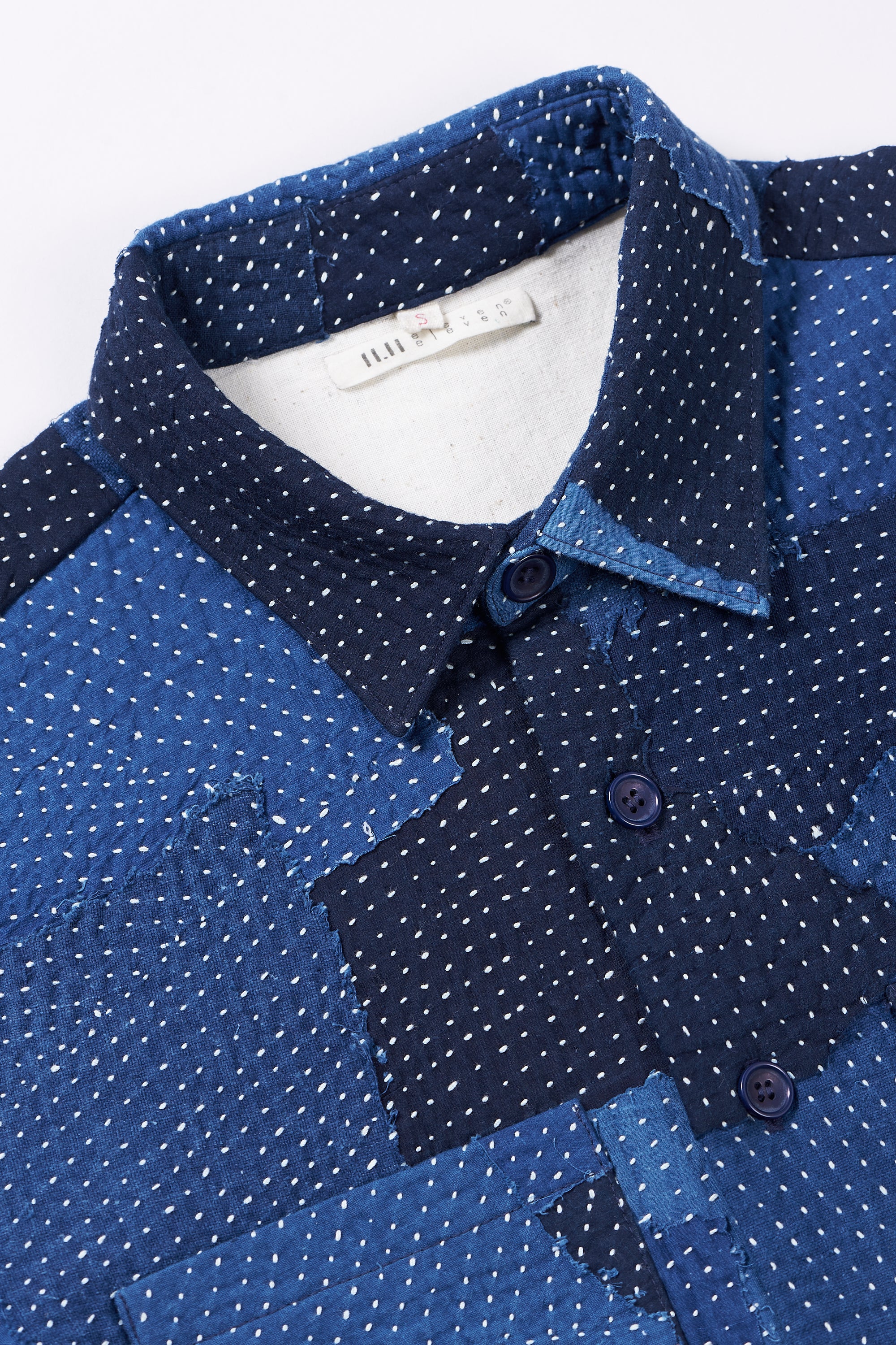 Fabric close-up with collar and buttons