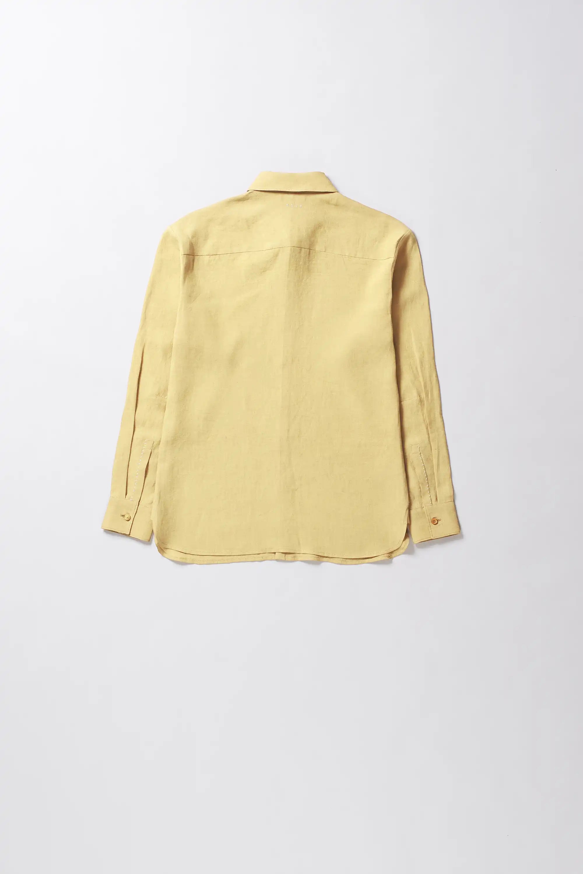 Back image of a yellow shirt on a white background