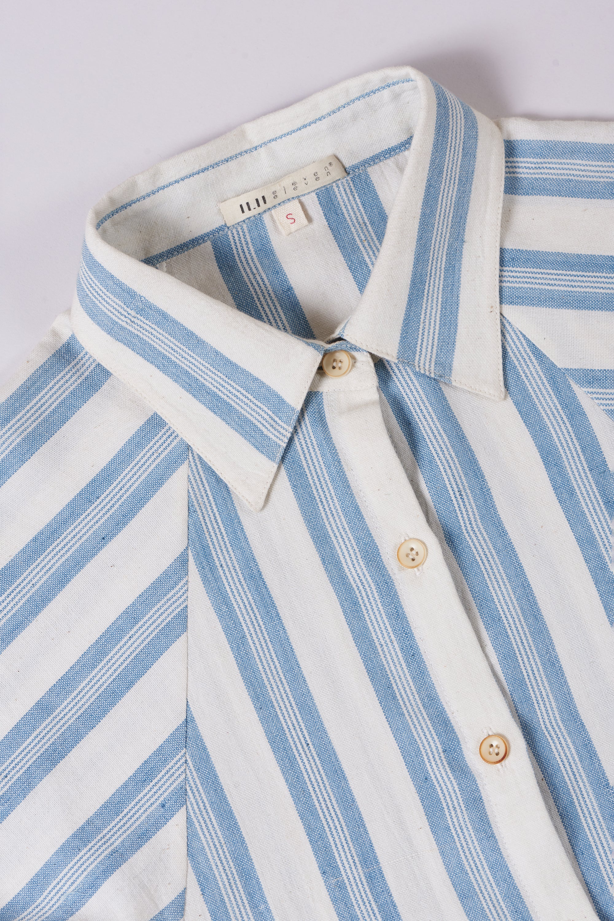 Fabric close-up with collar and buttons