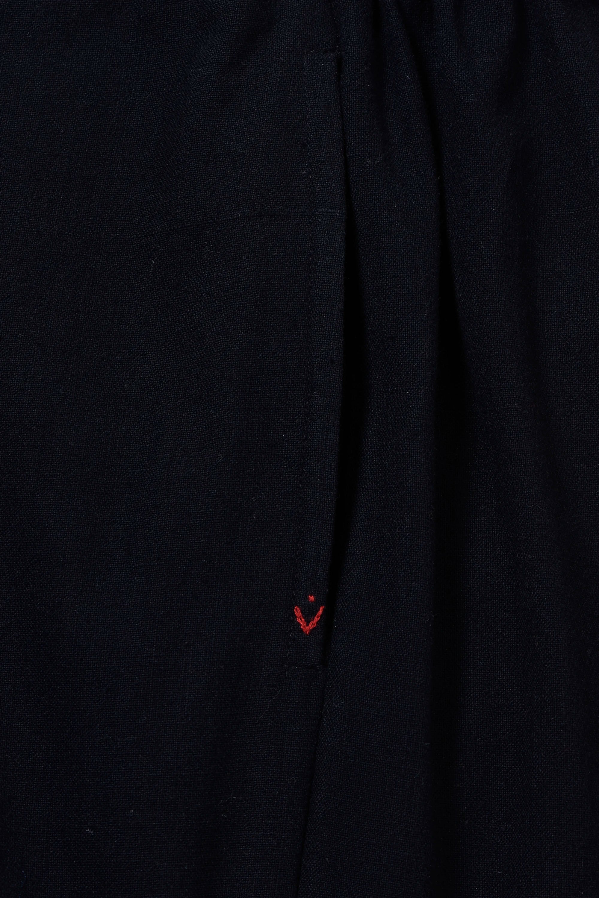 Fabric close-up with pehchan and pocket