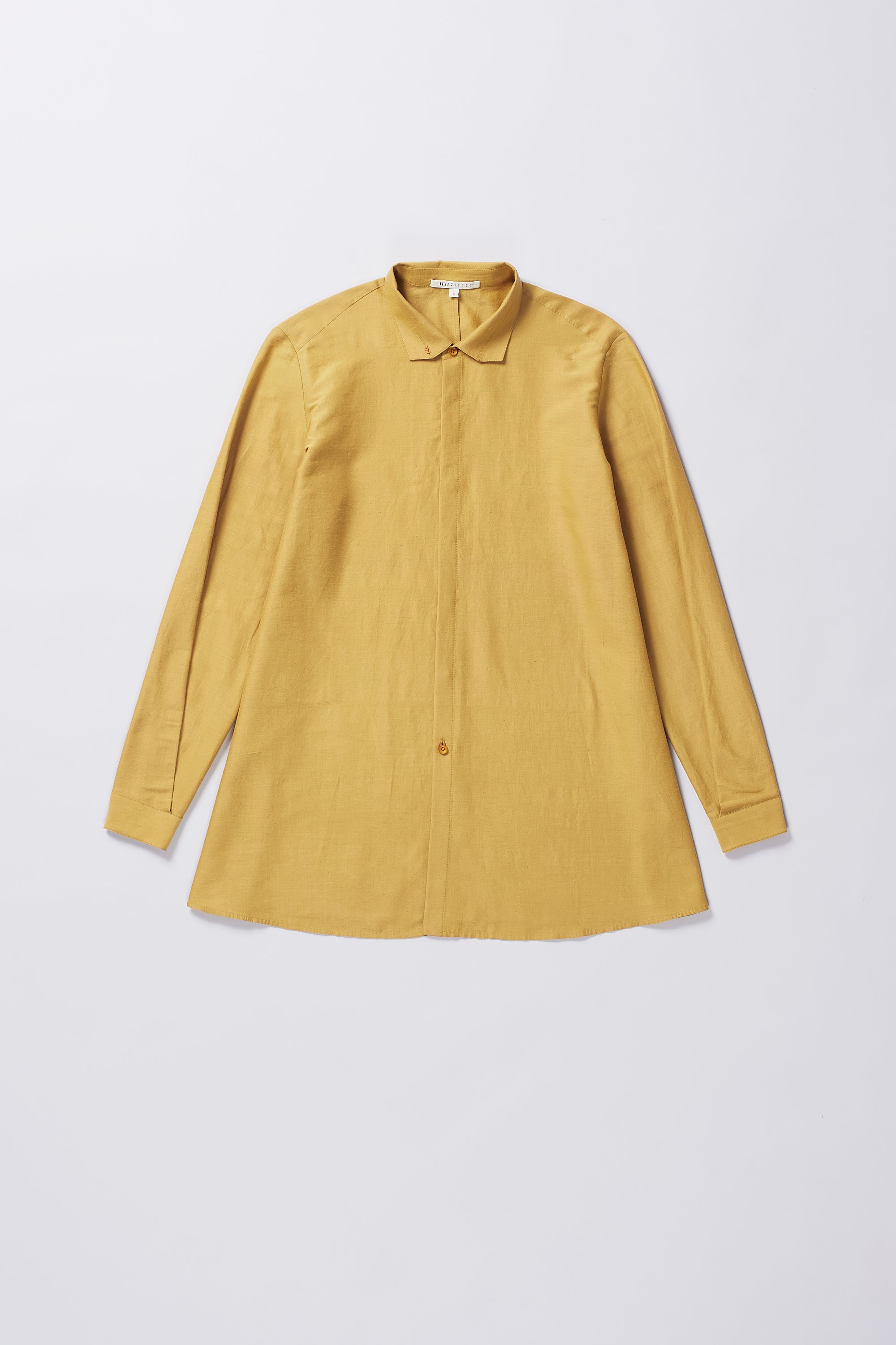 Front image of a mustard yellow shirt