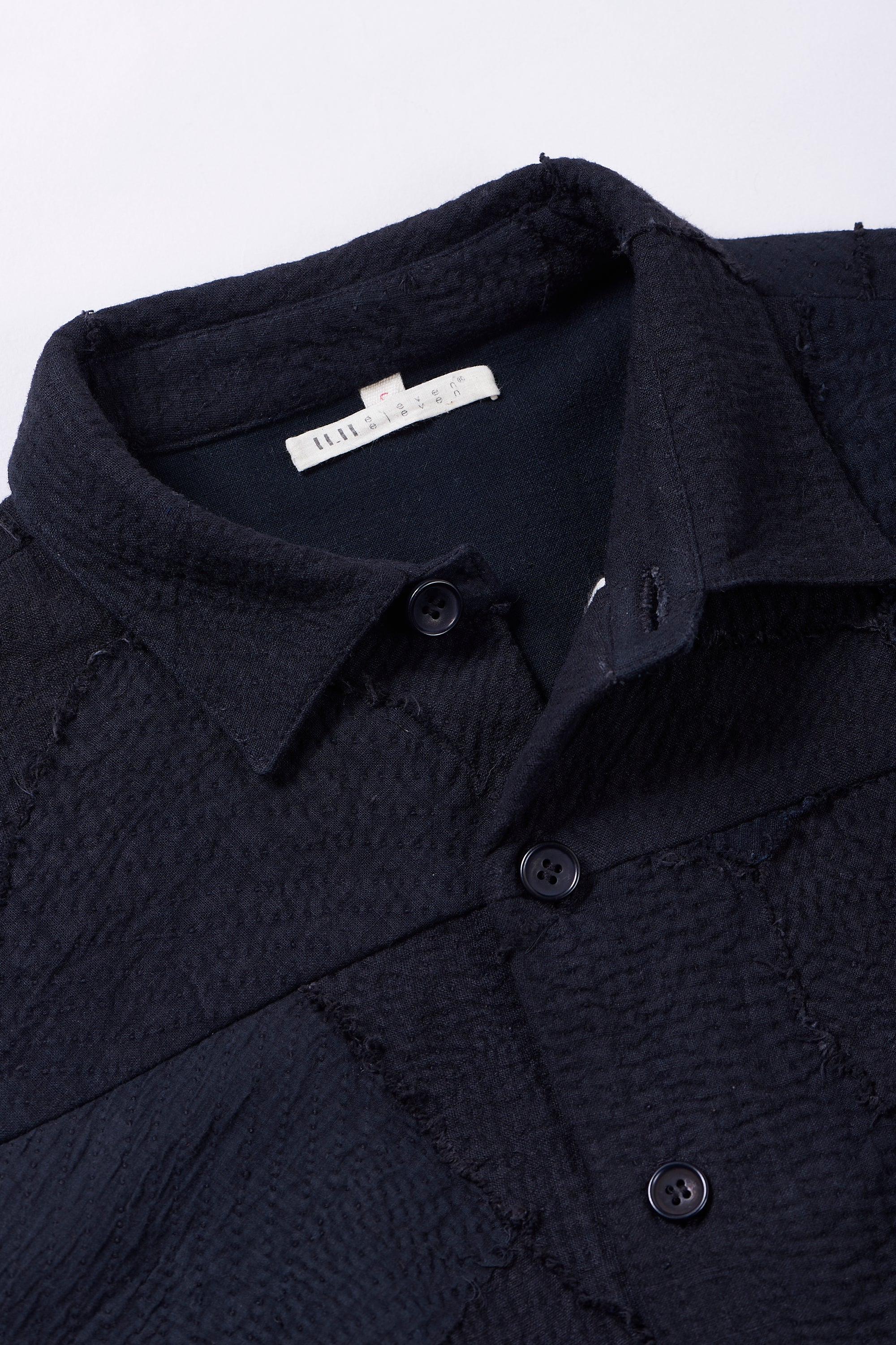 Fabric close-up with collar and buttons