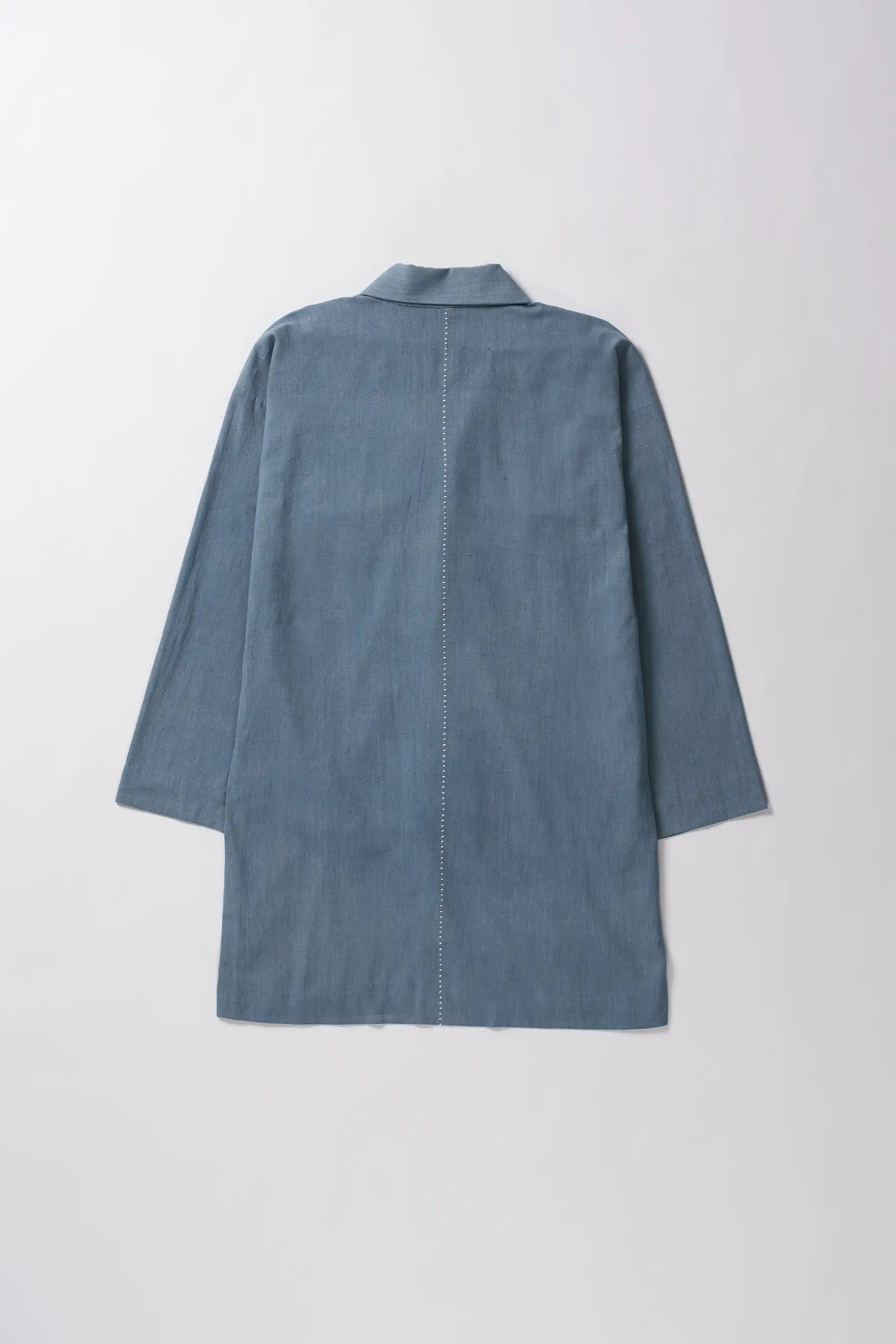 Back image of a powder blue shrug