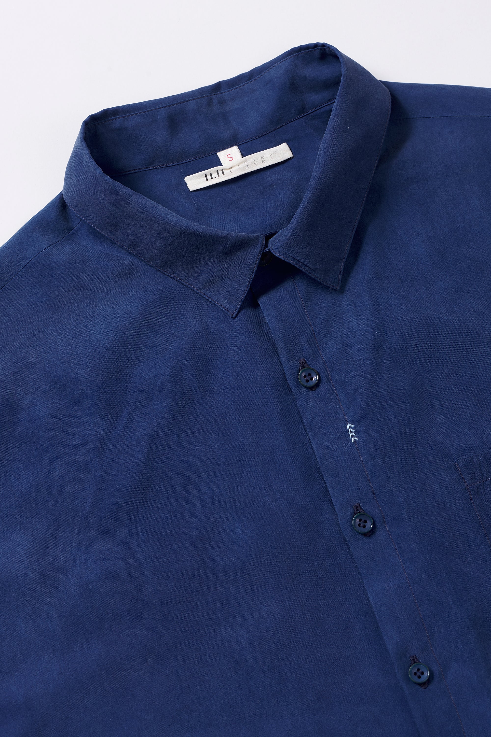 Fabric close-up with collar and buttons