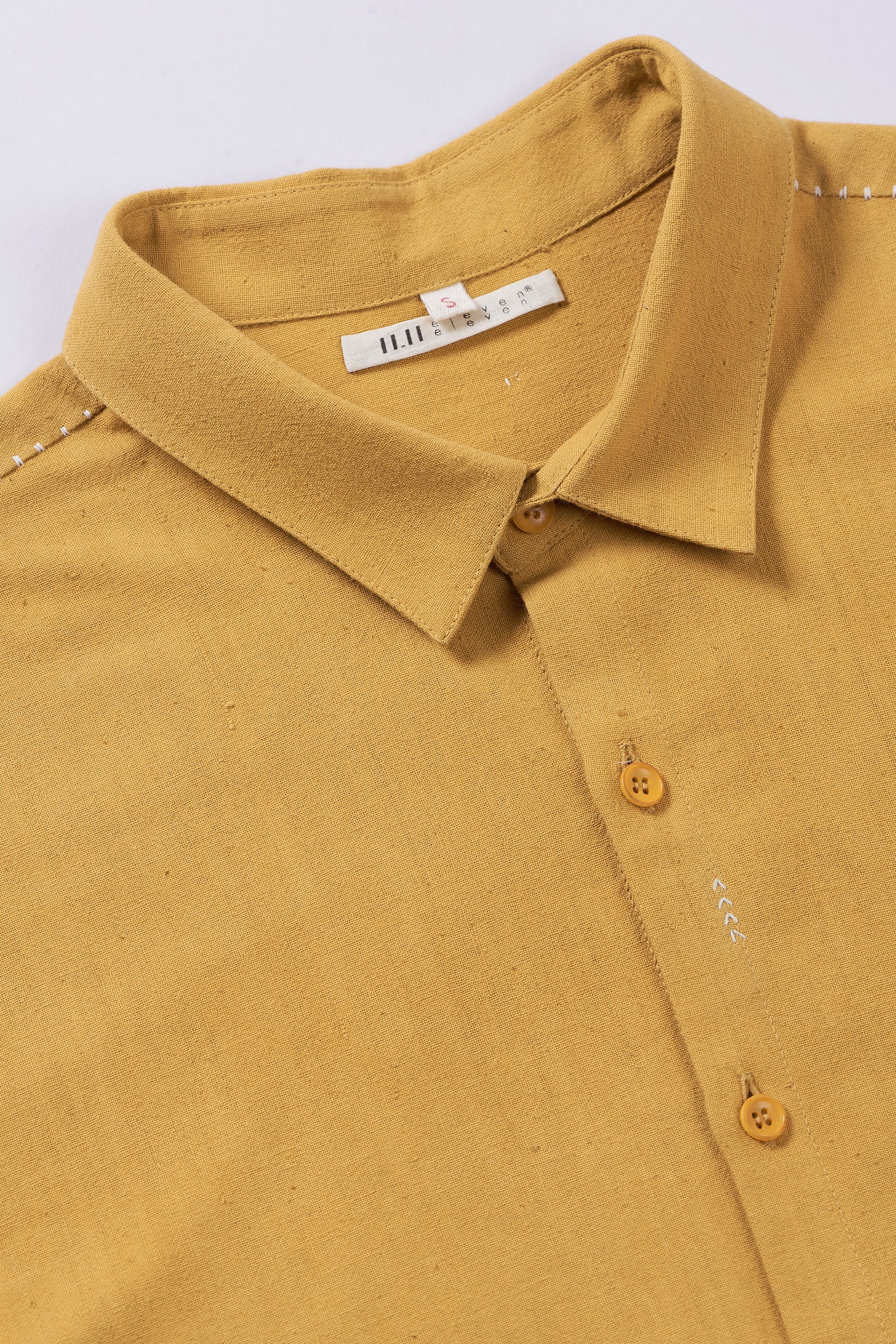 Fabric close-up with collar and buttons