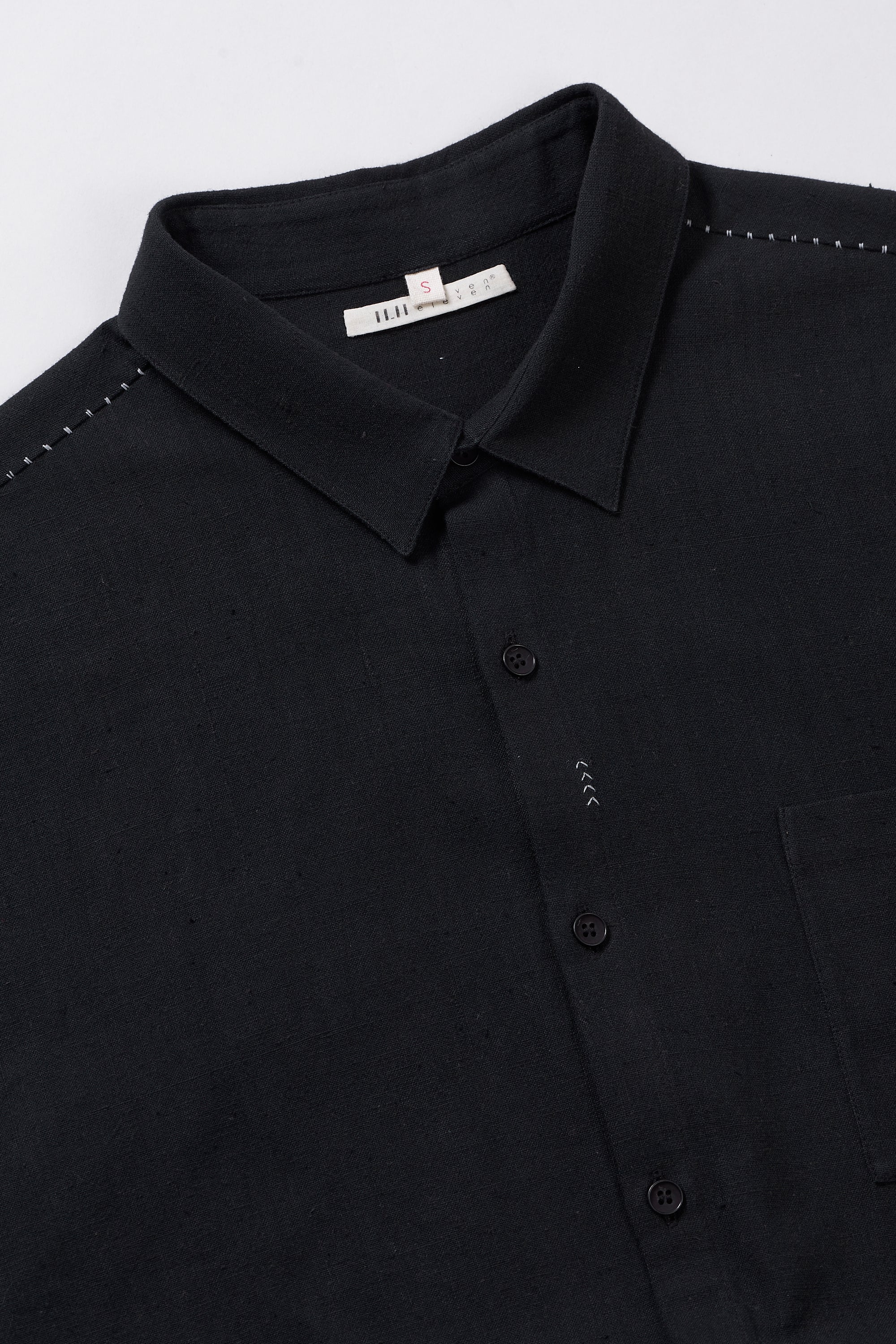 Fabric close-up with collar and buttons