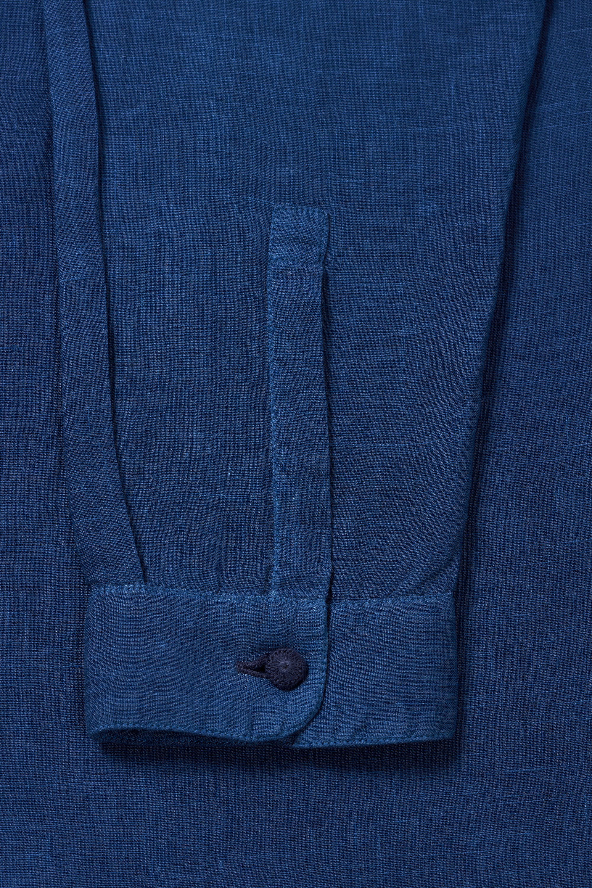 Close-up shot of a sleeve with button 