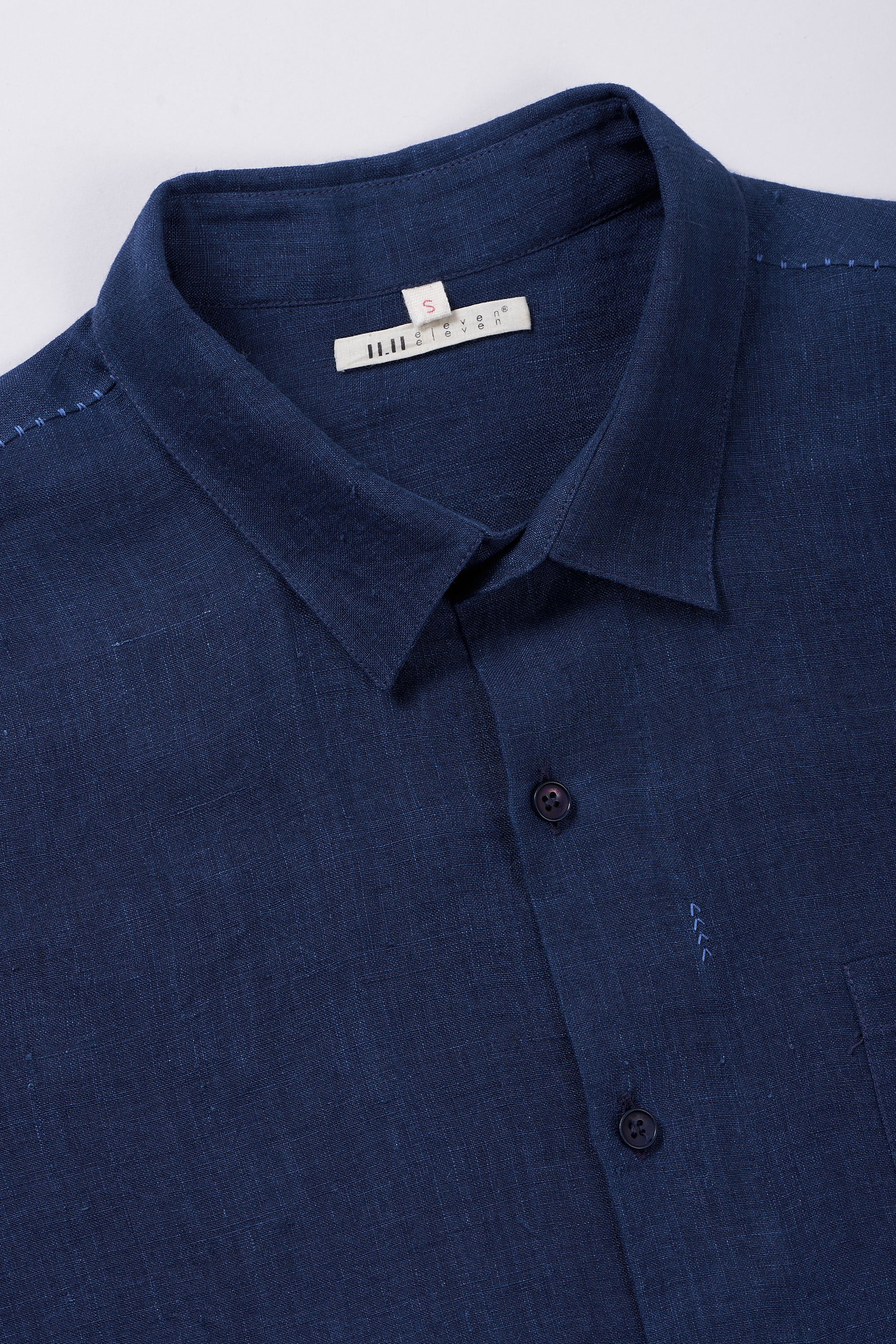 Fabric close-up of with buttons and collar