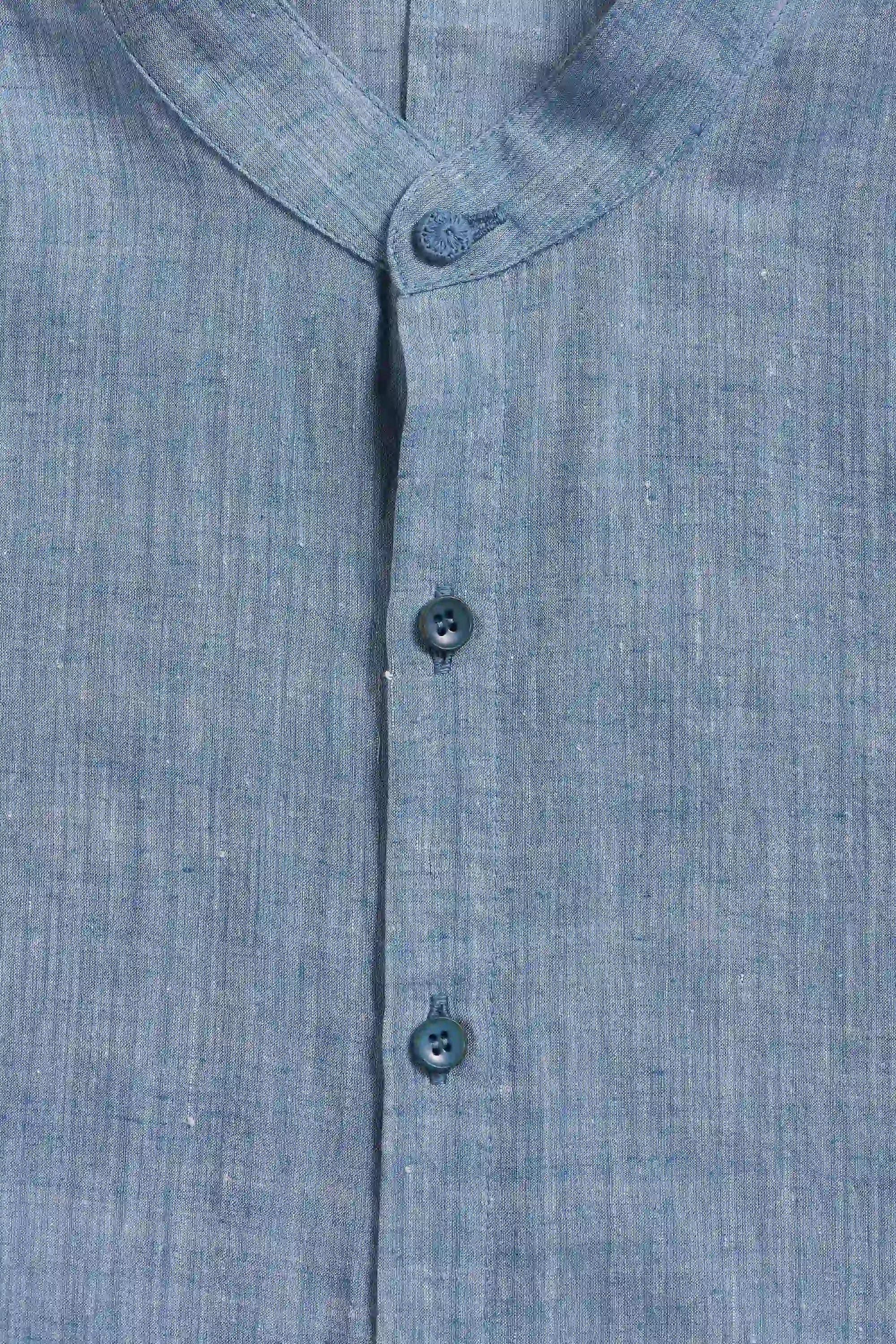 Close-up of a blue shirt with buttons