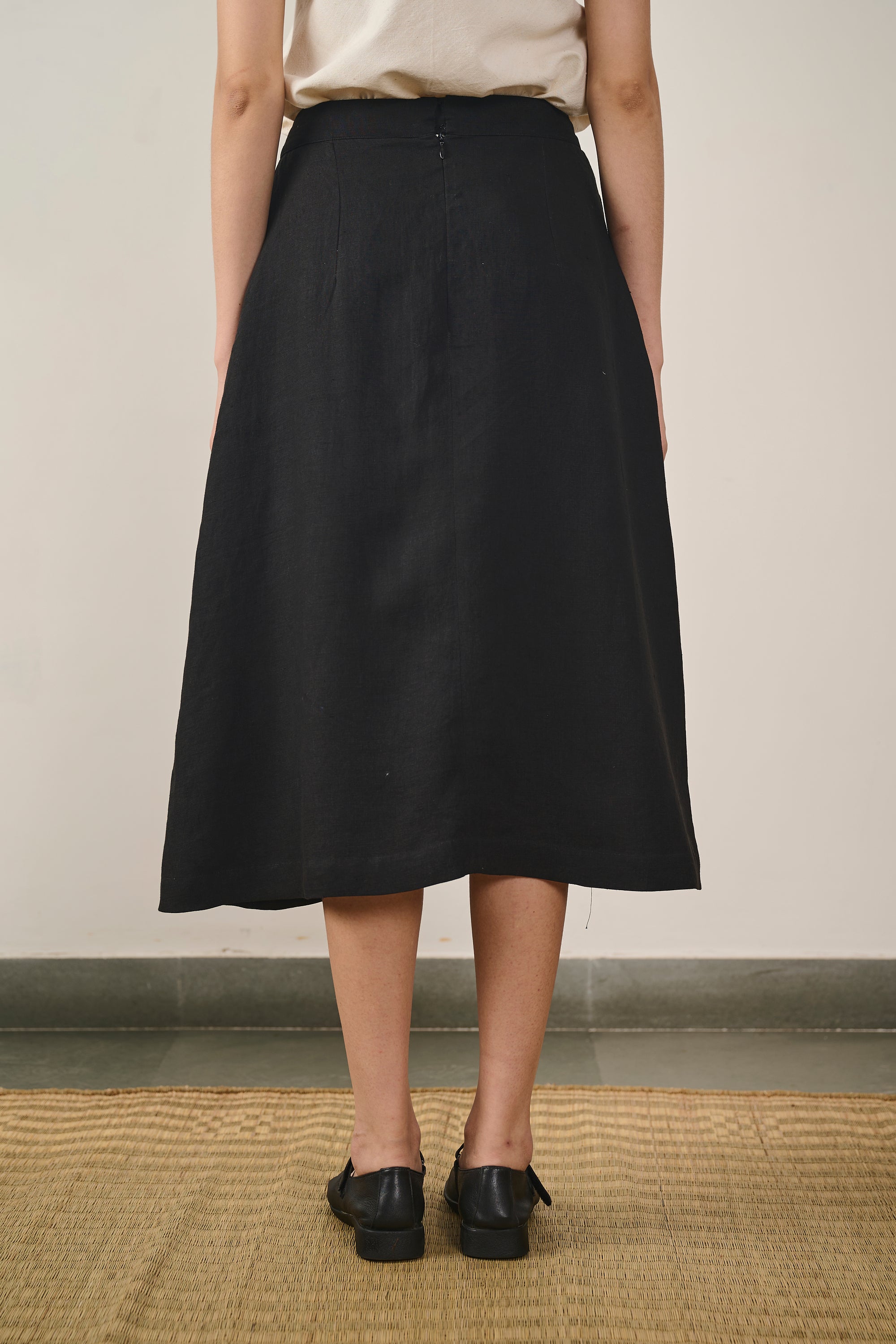 Back image of a black skirt
