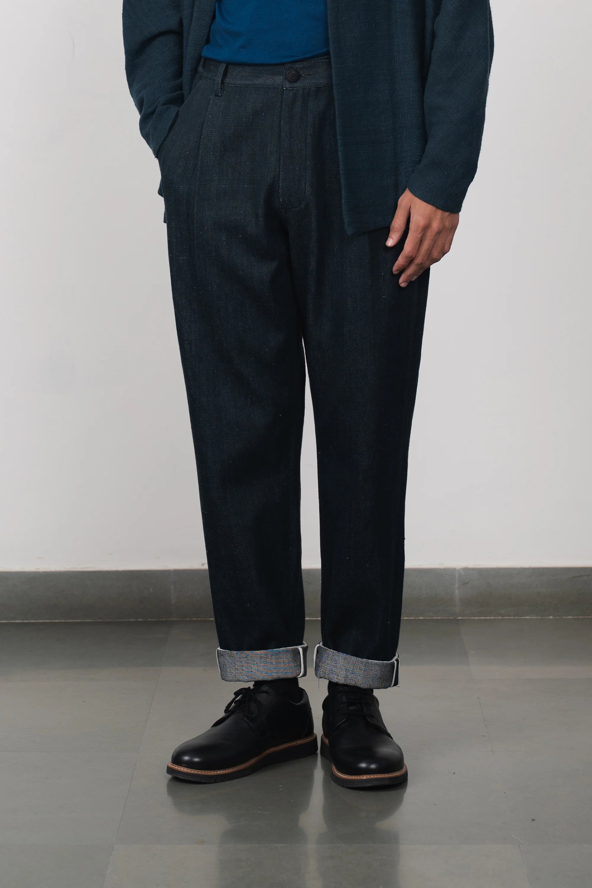 A man wearing midnight indigo pant