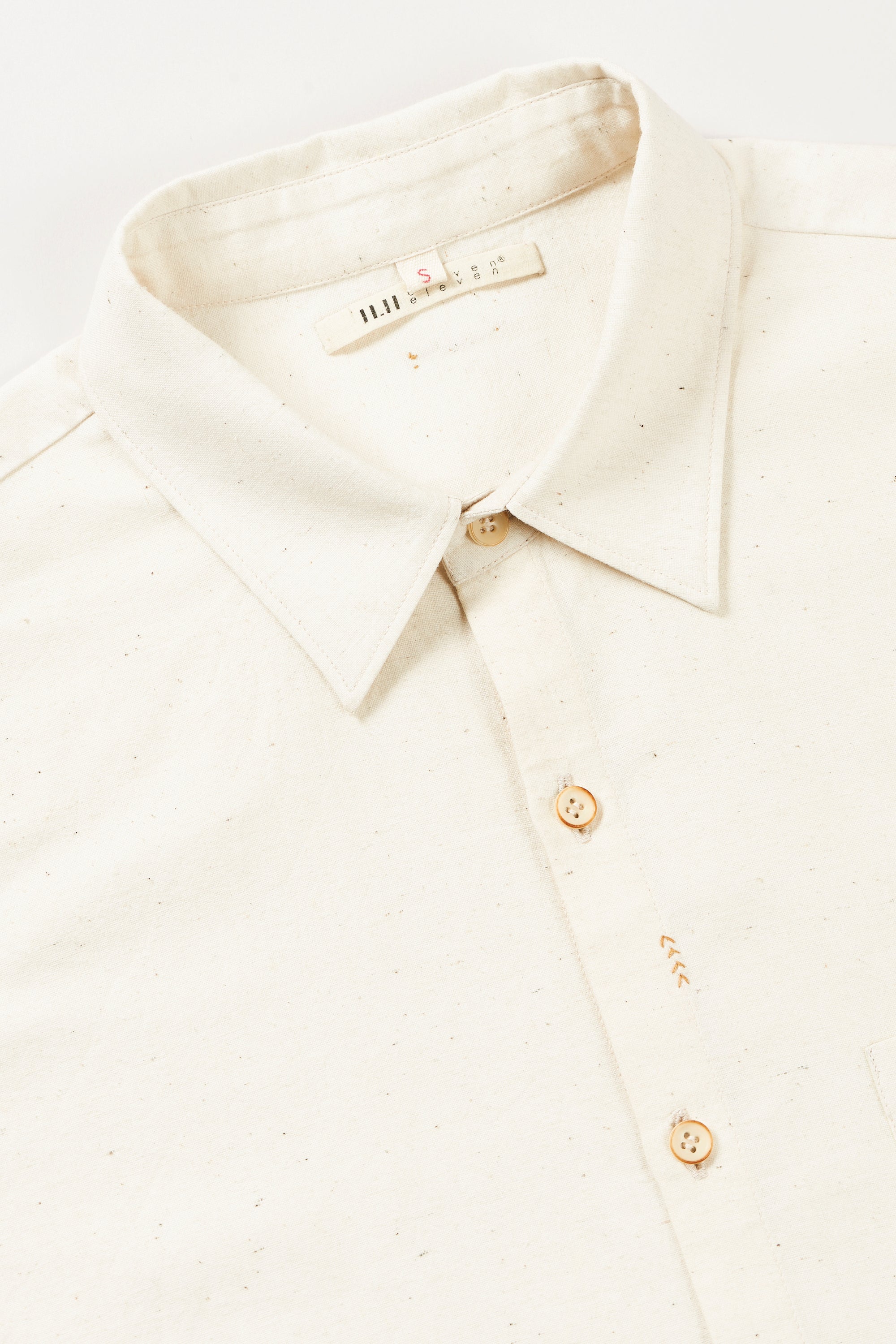 Fabric close-up with collar and buttons