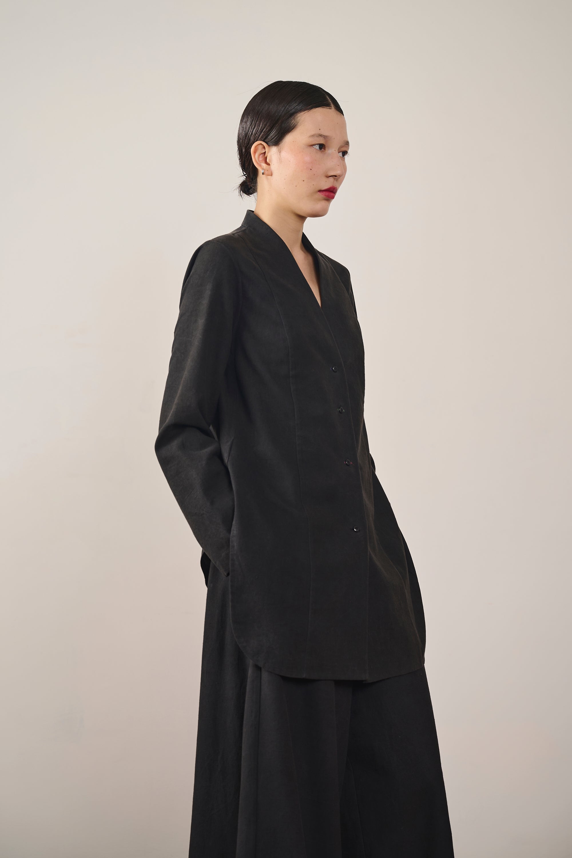 A woman wearing black cotton shirt
