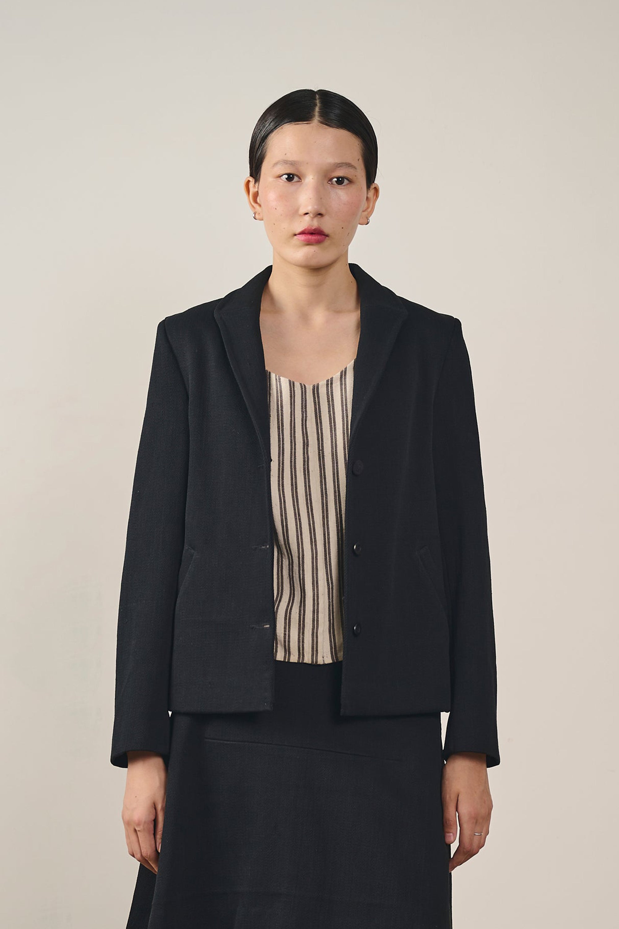 A woman wearing black jacket