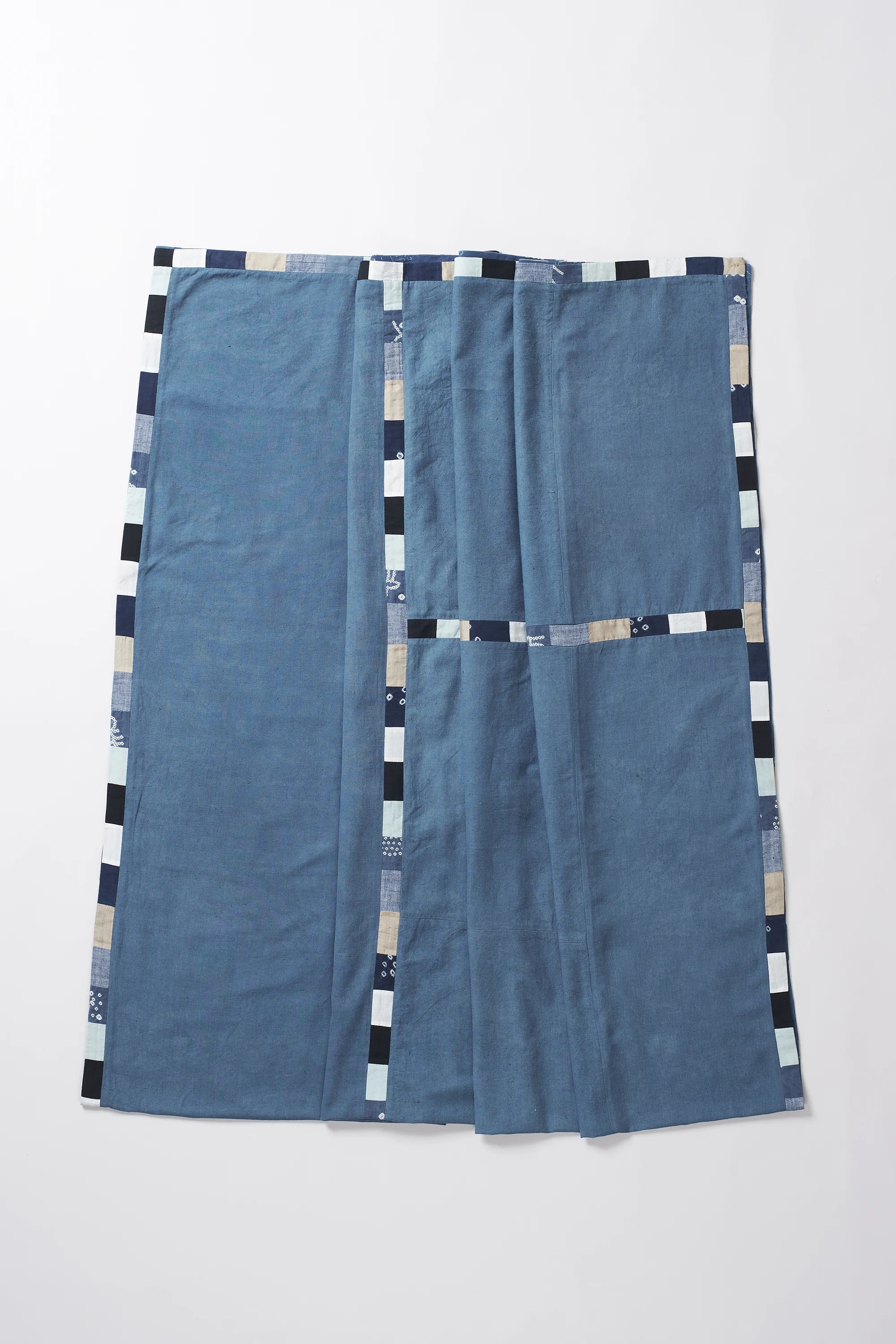 Estate blue table cloth on a light grey background
