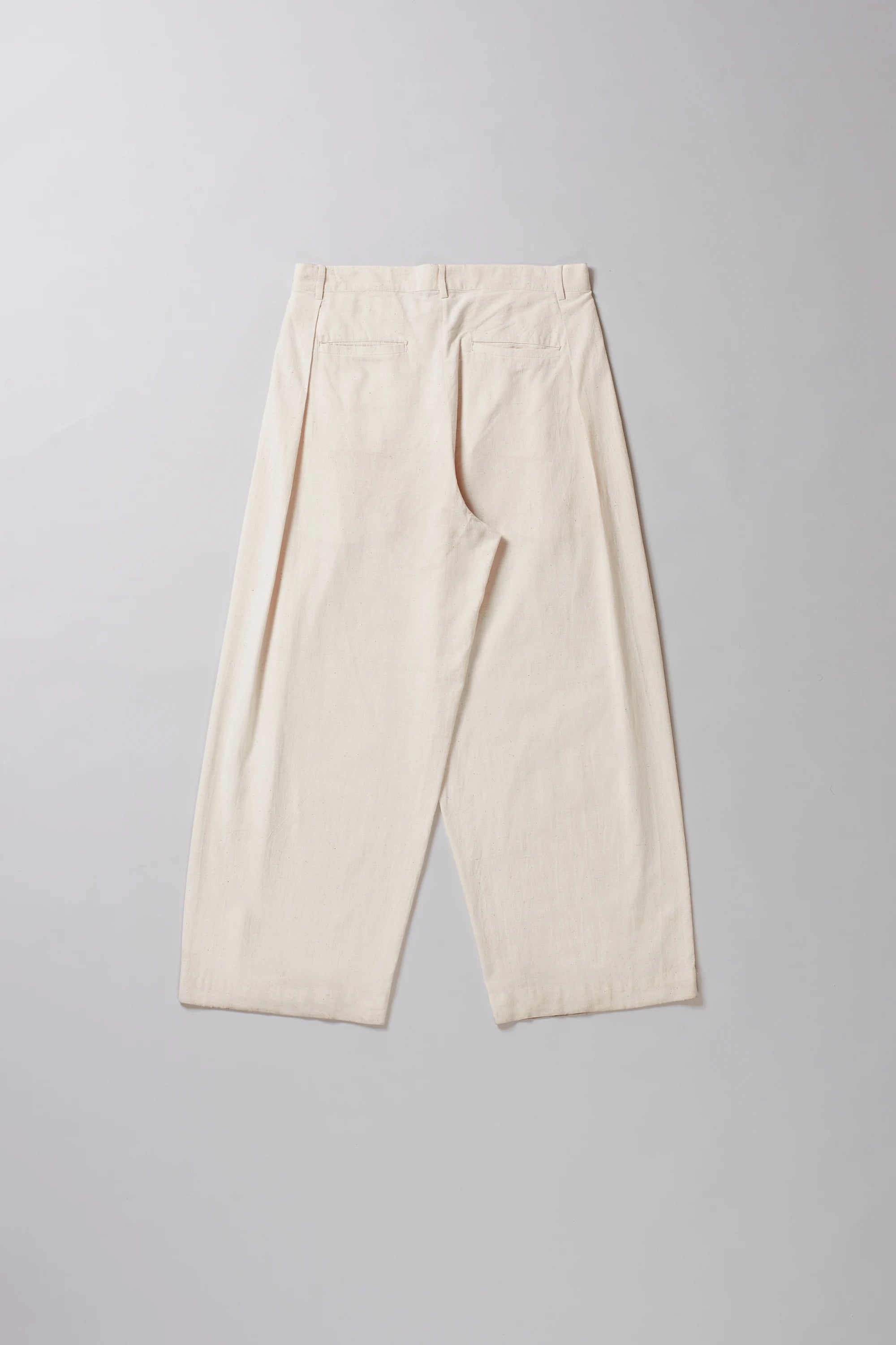 Back image of a ecru cotton pant