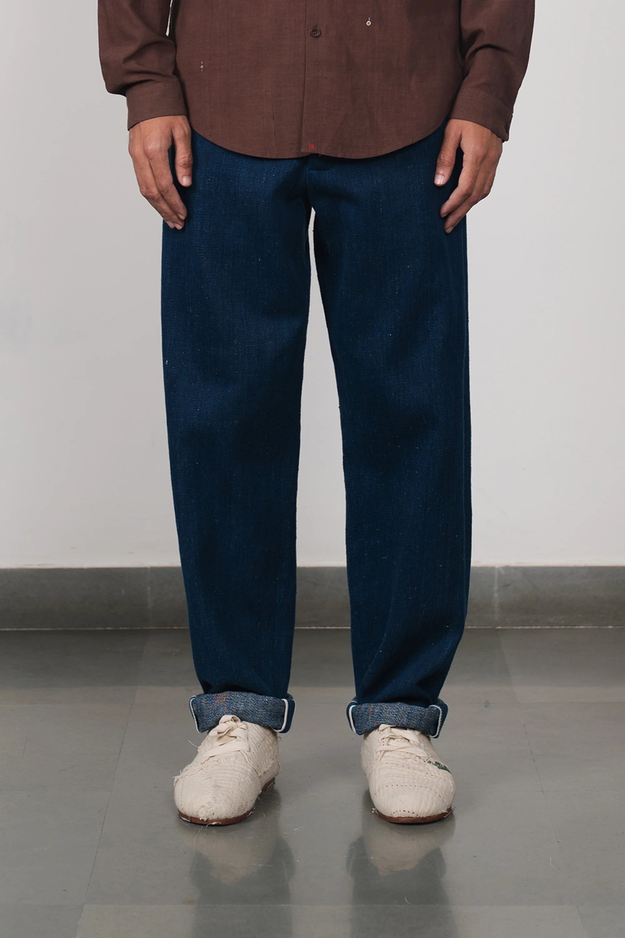 A man wearing cotton denim pant in indigo
