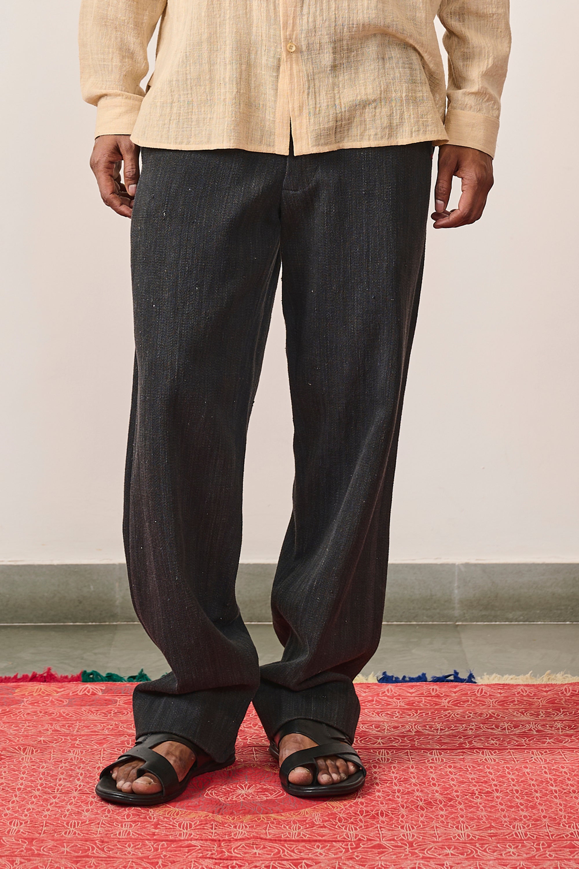 A man wearing midnight indigo denim pant