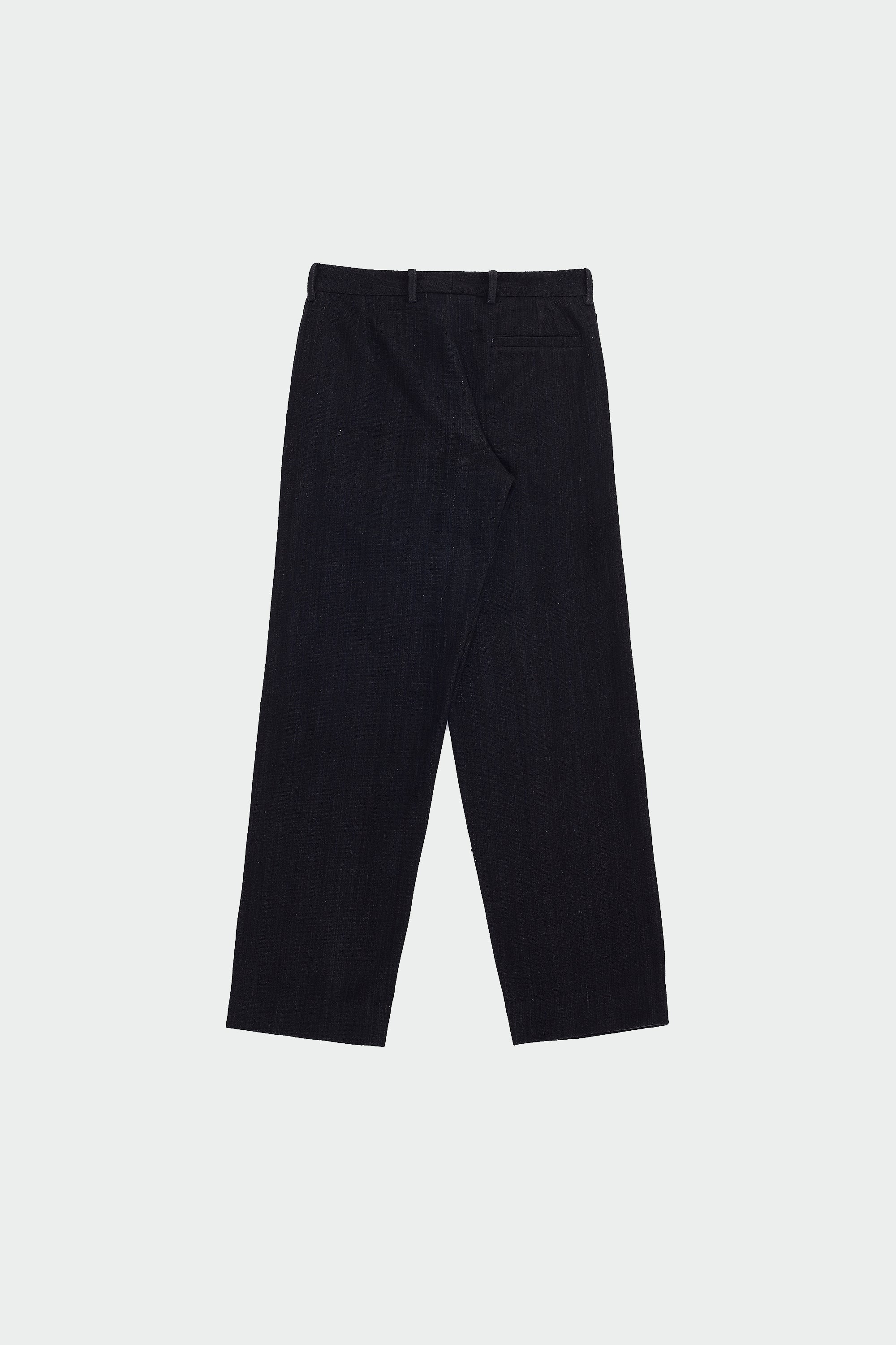 Back image of a midnight indigo pant