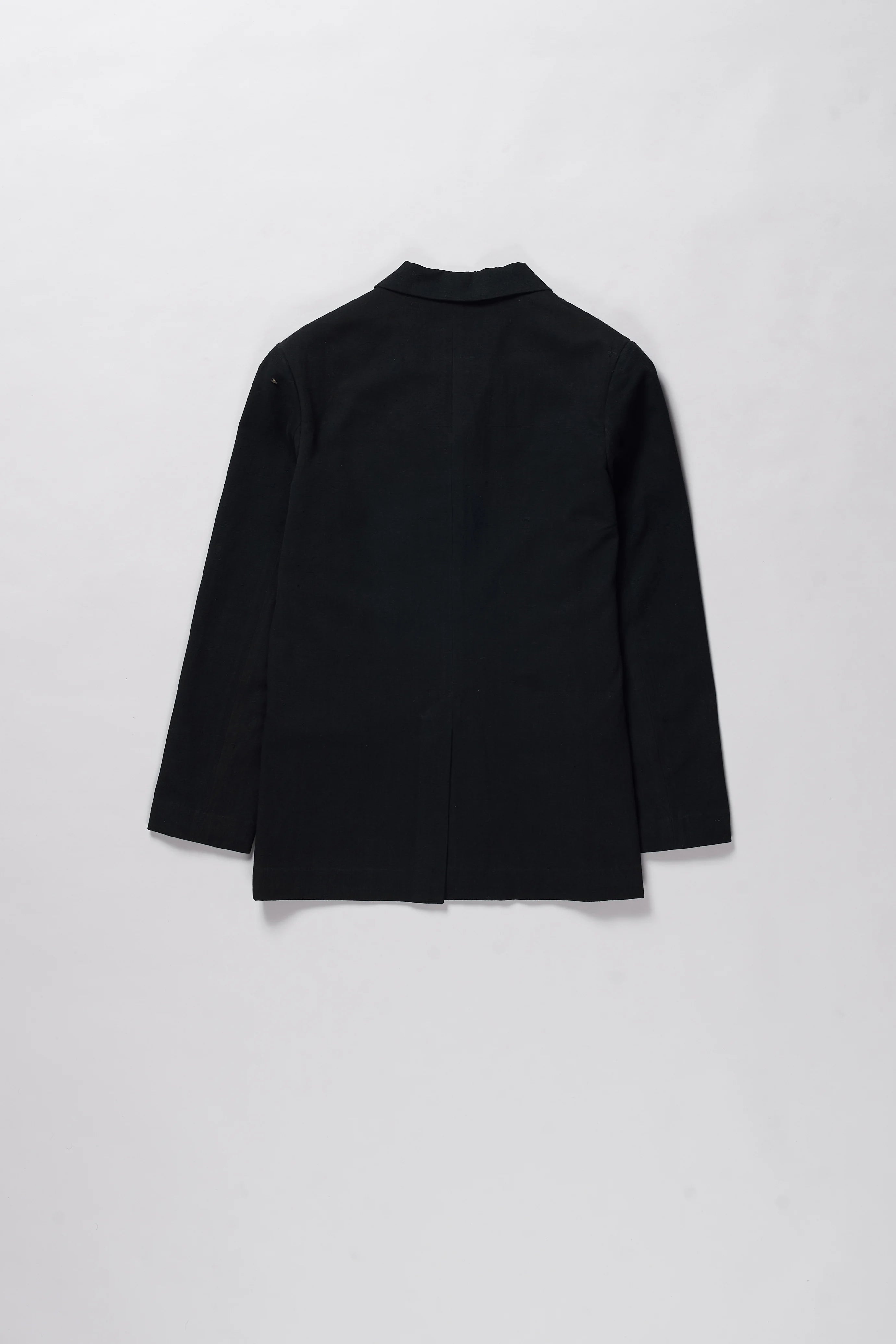 Back image of a black cotton jacket