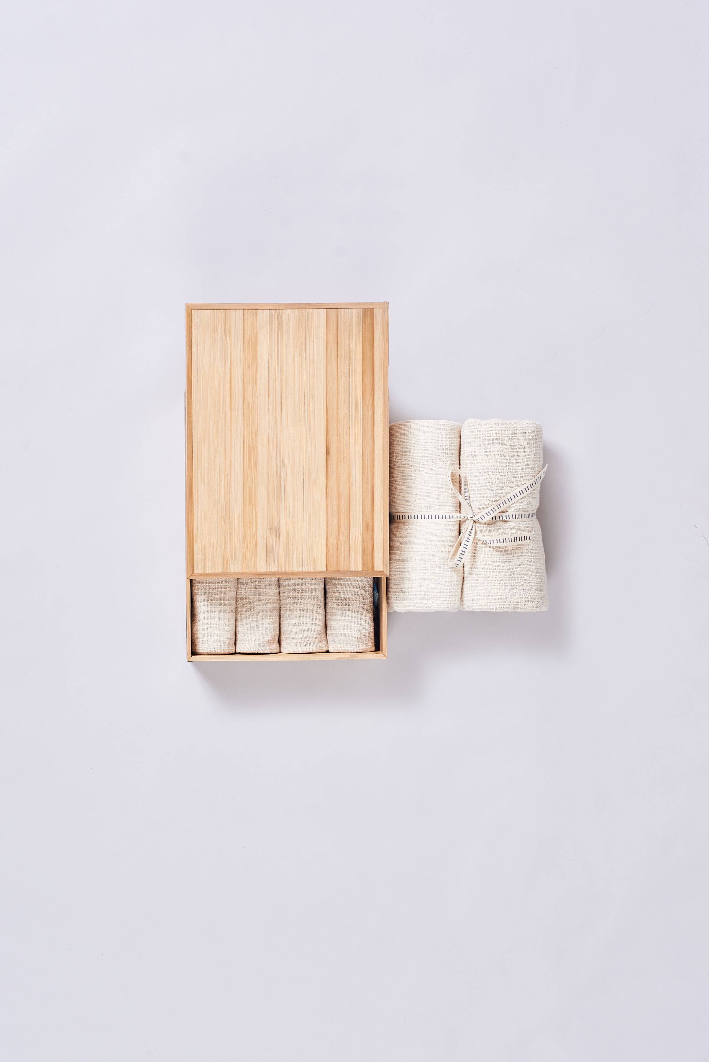 Wooden box with ecru towel
