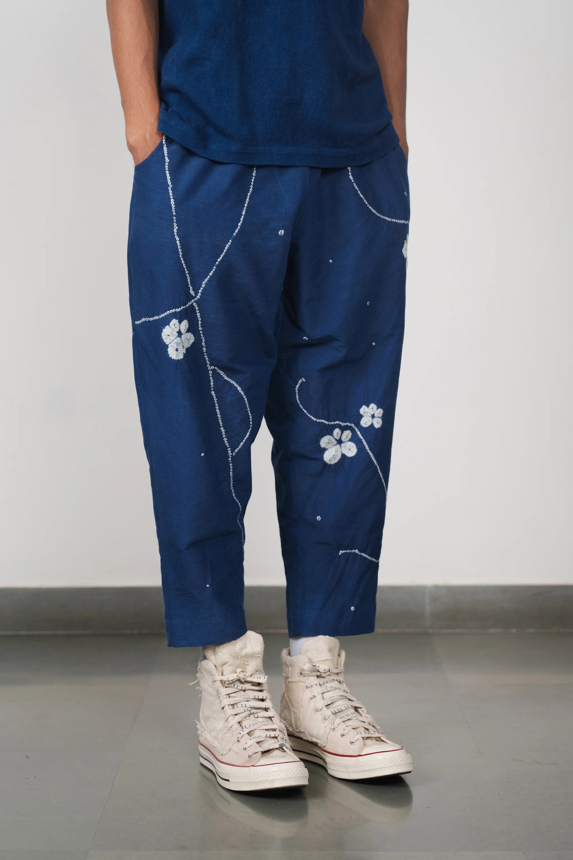A close-up shot of medium indigo pant