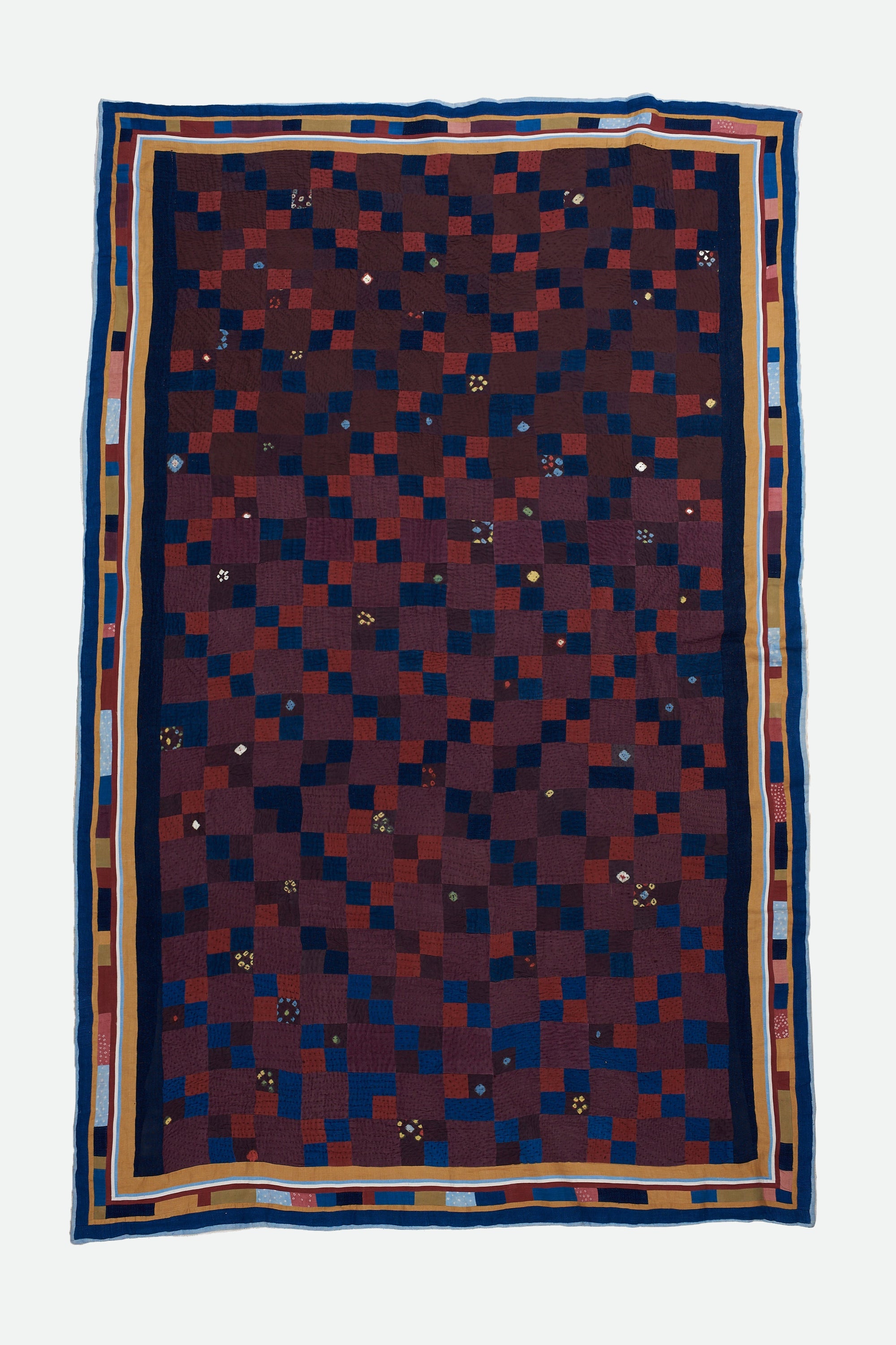 Multi colour patchwork quilt
