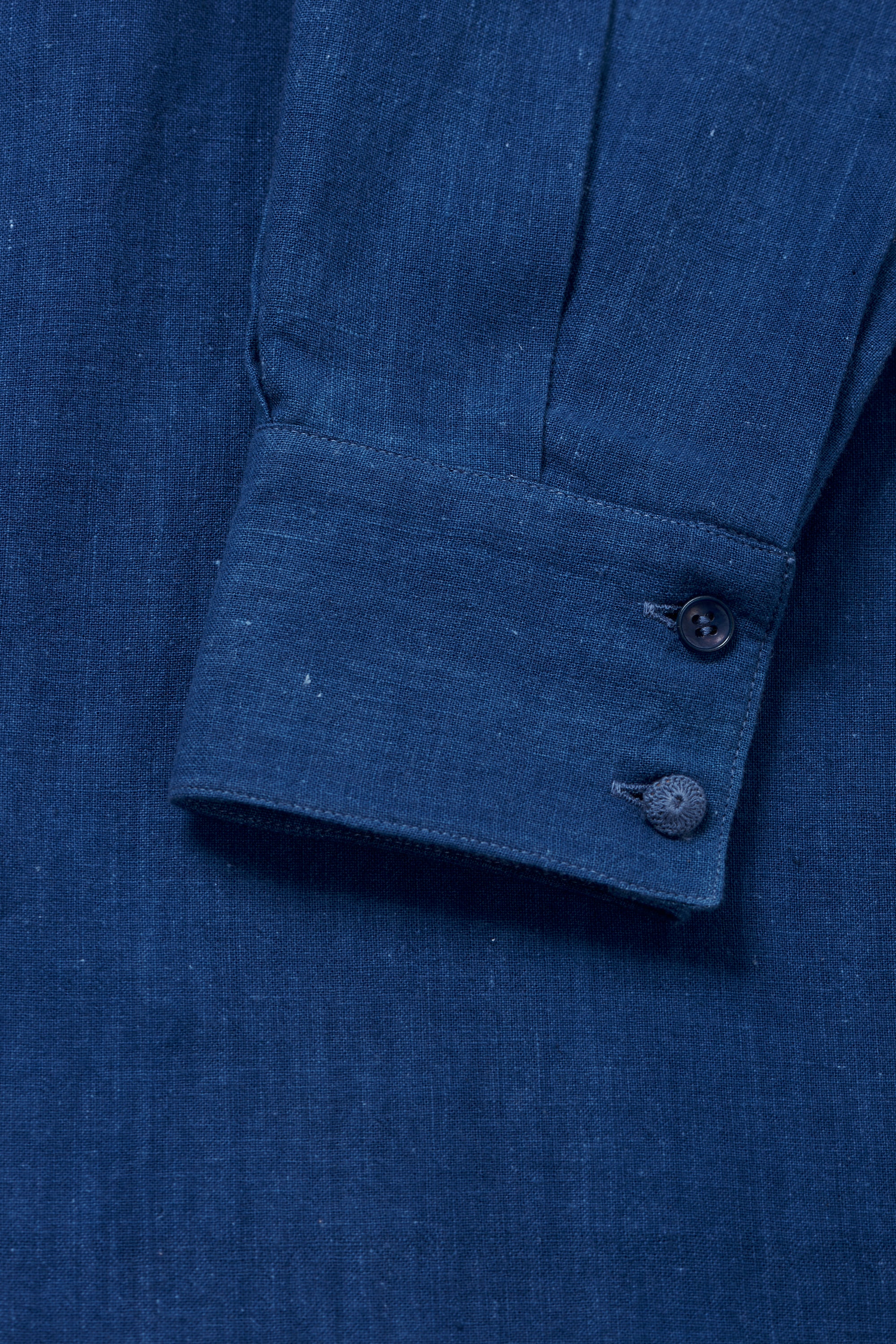 Close-up shot of sleeve with buttons