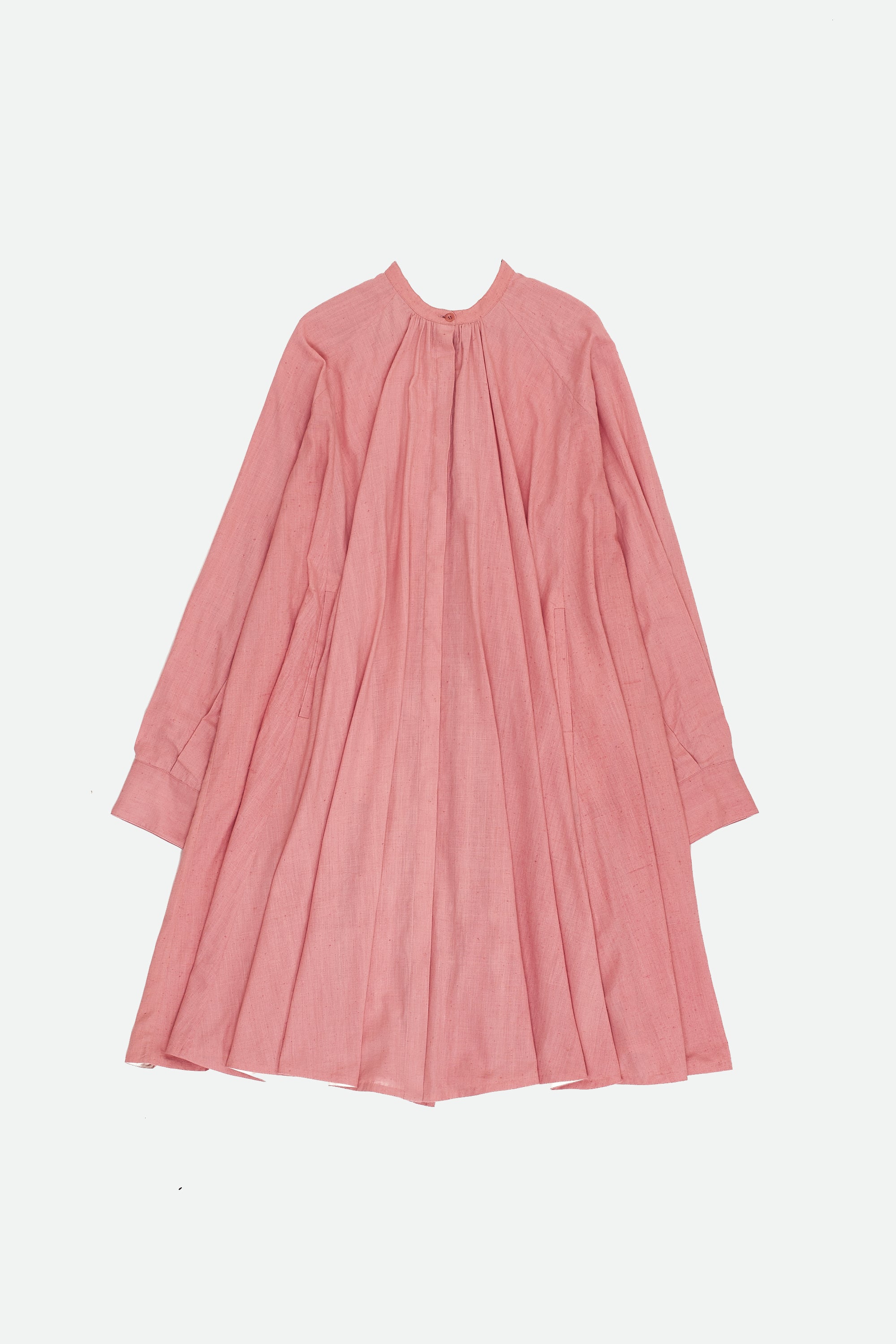 Front image of a chalk pink cotton dress