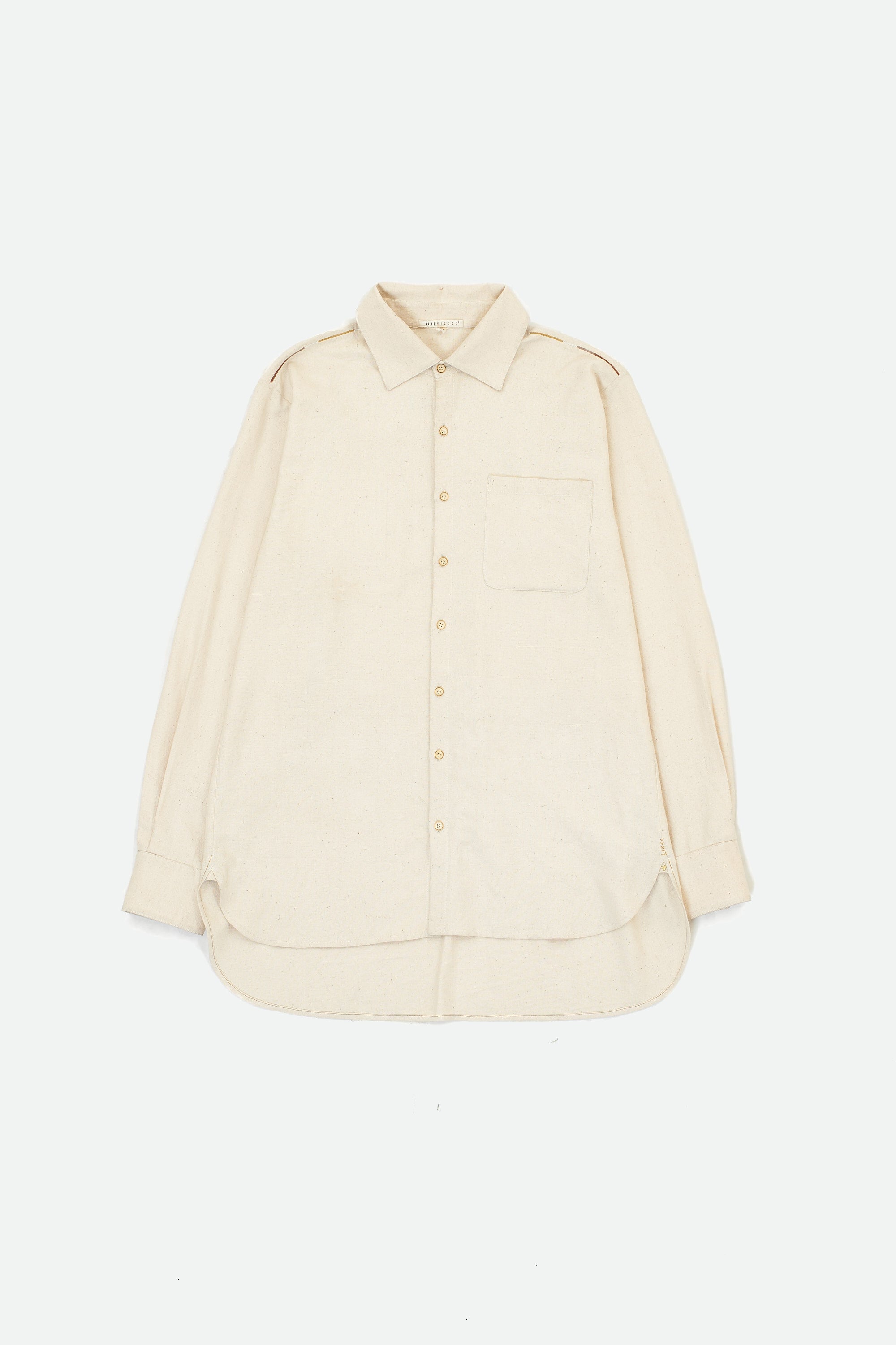 Ecru cotton shirt with hand detailing