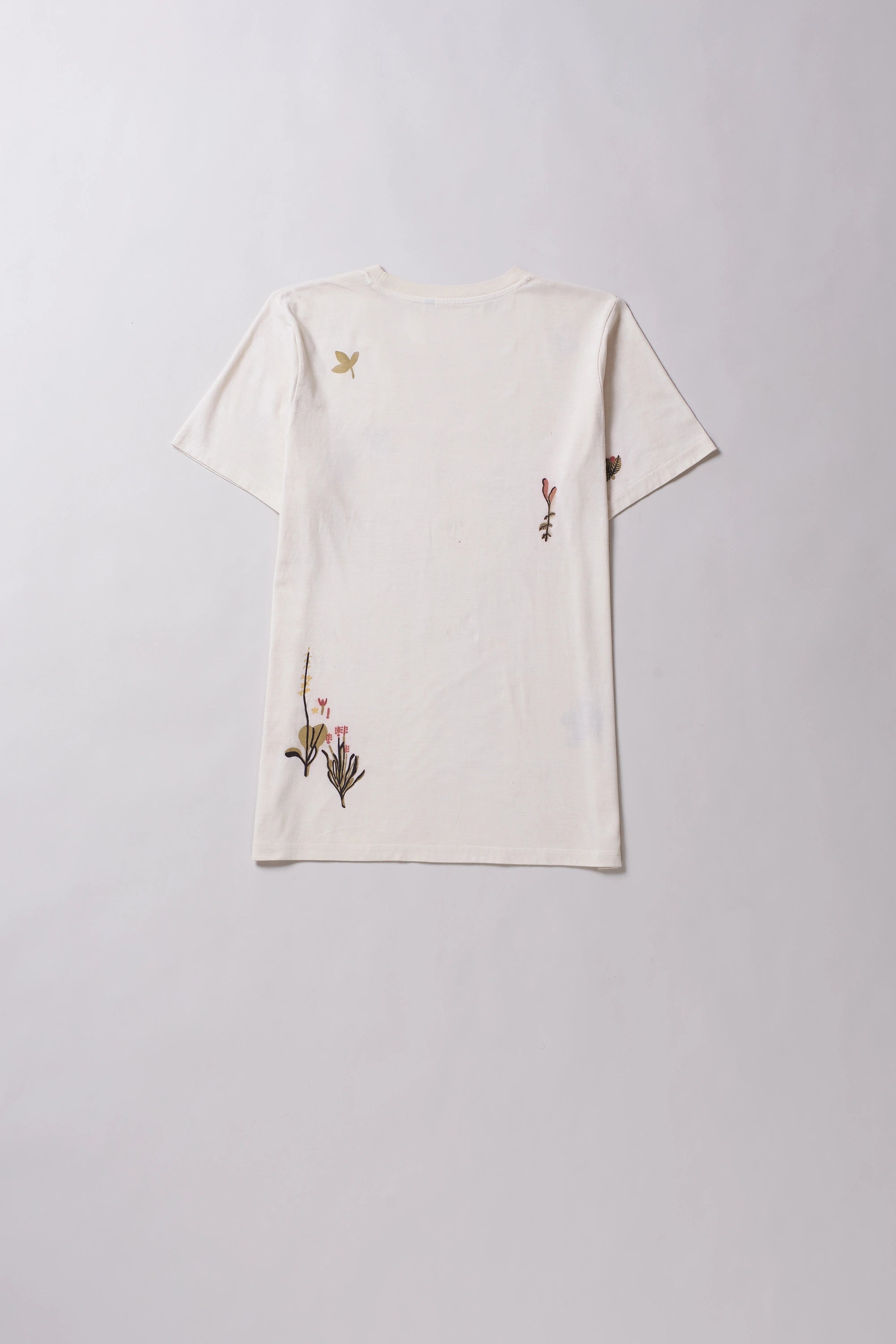 Back image ecru cotton t-shirt with floral hand paint artwork