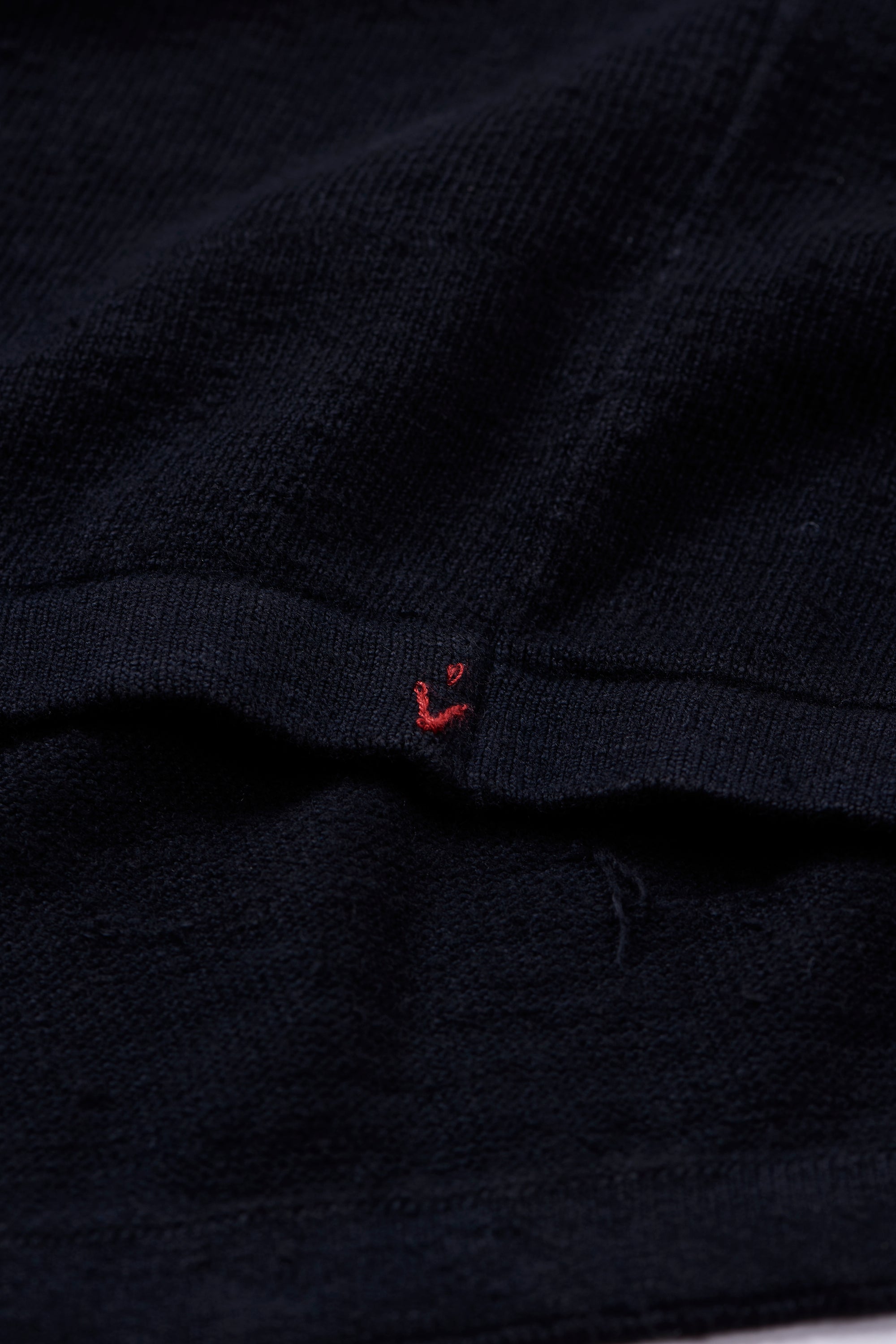 Close-up of a black t-shirt with pehchan