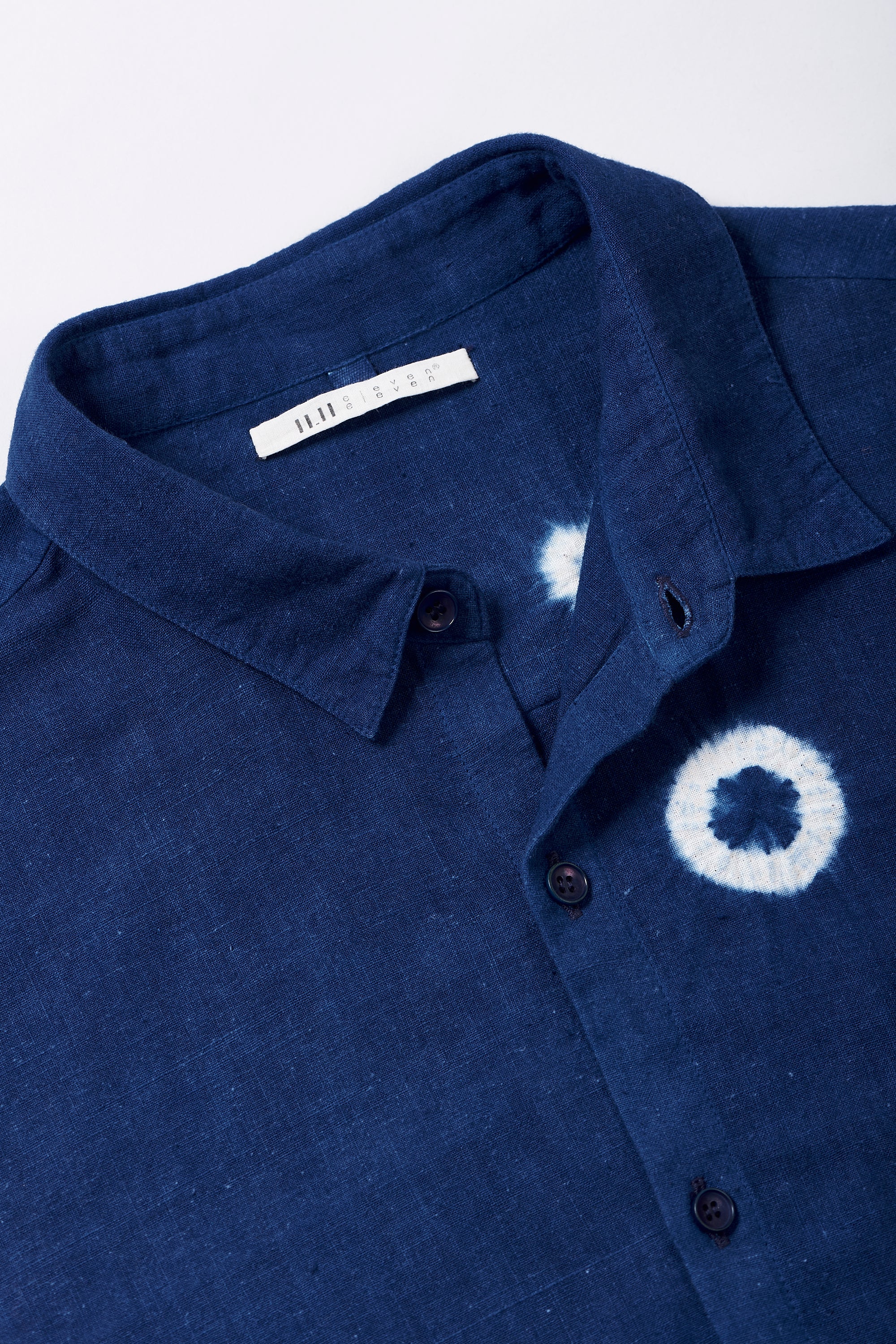 Fabric close-up with buttons and collar