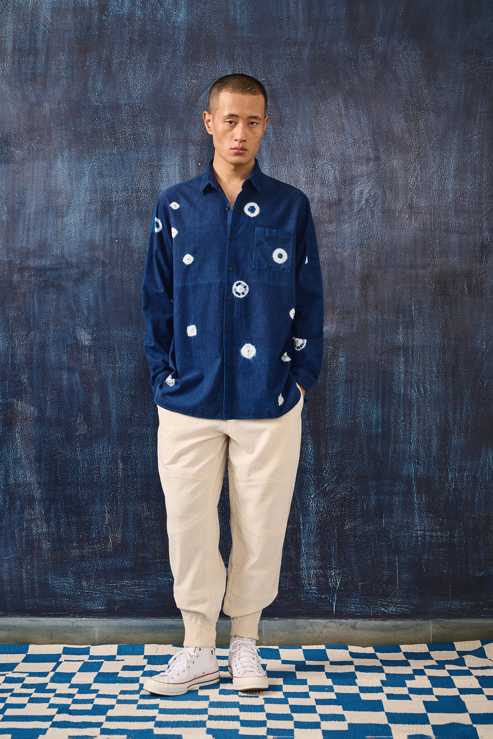 A man wearing cotton shibori shirt