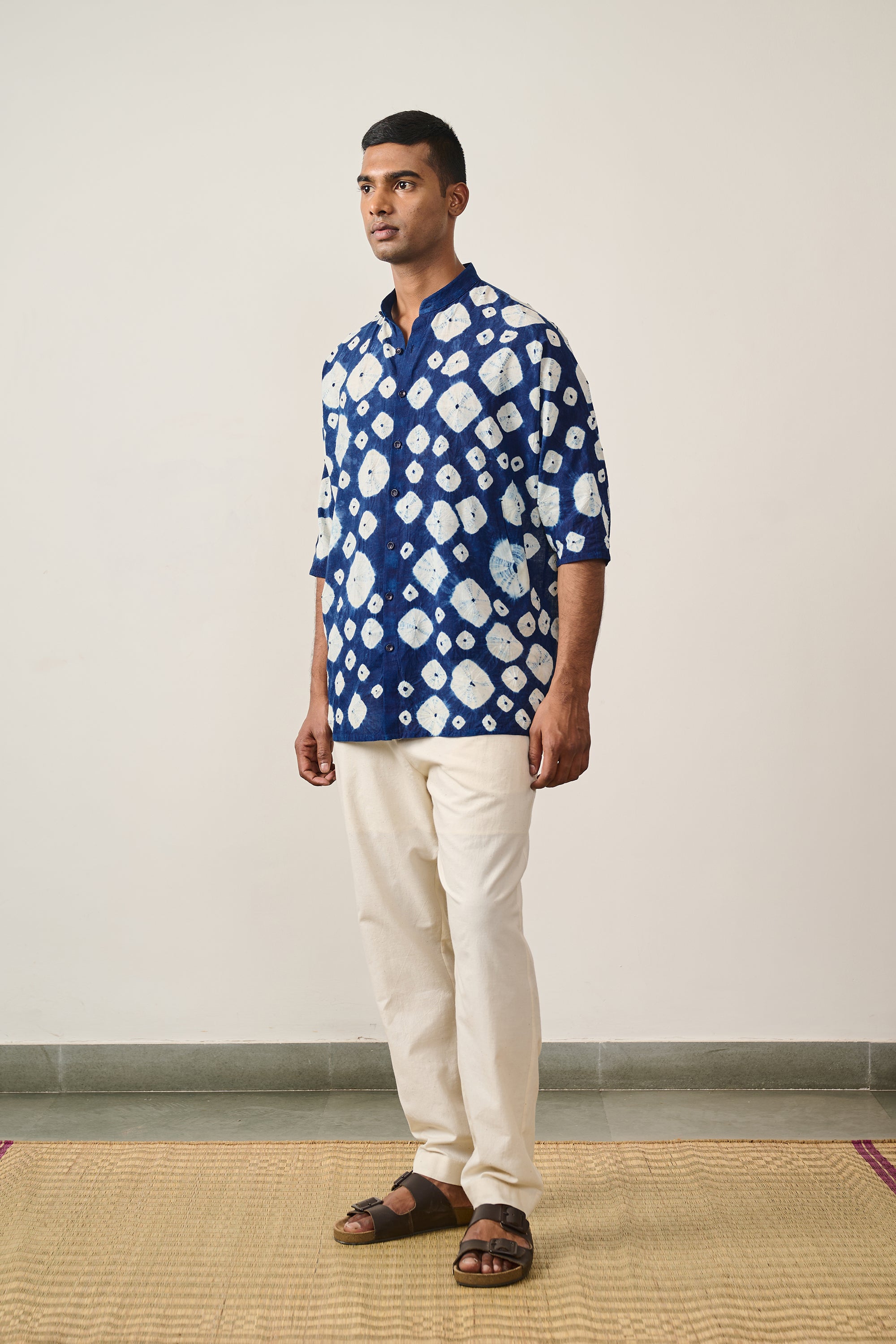 A man wearing cotton shibori shirt