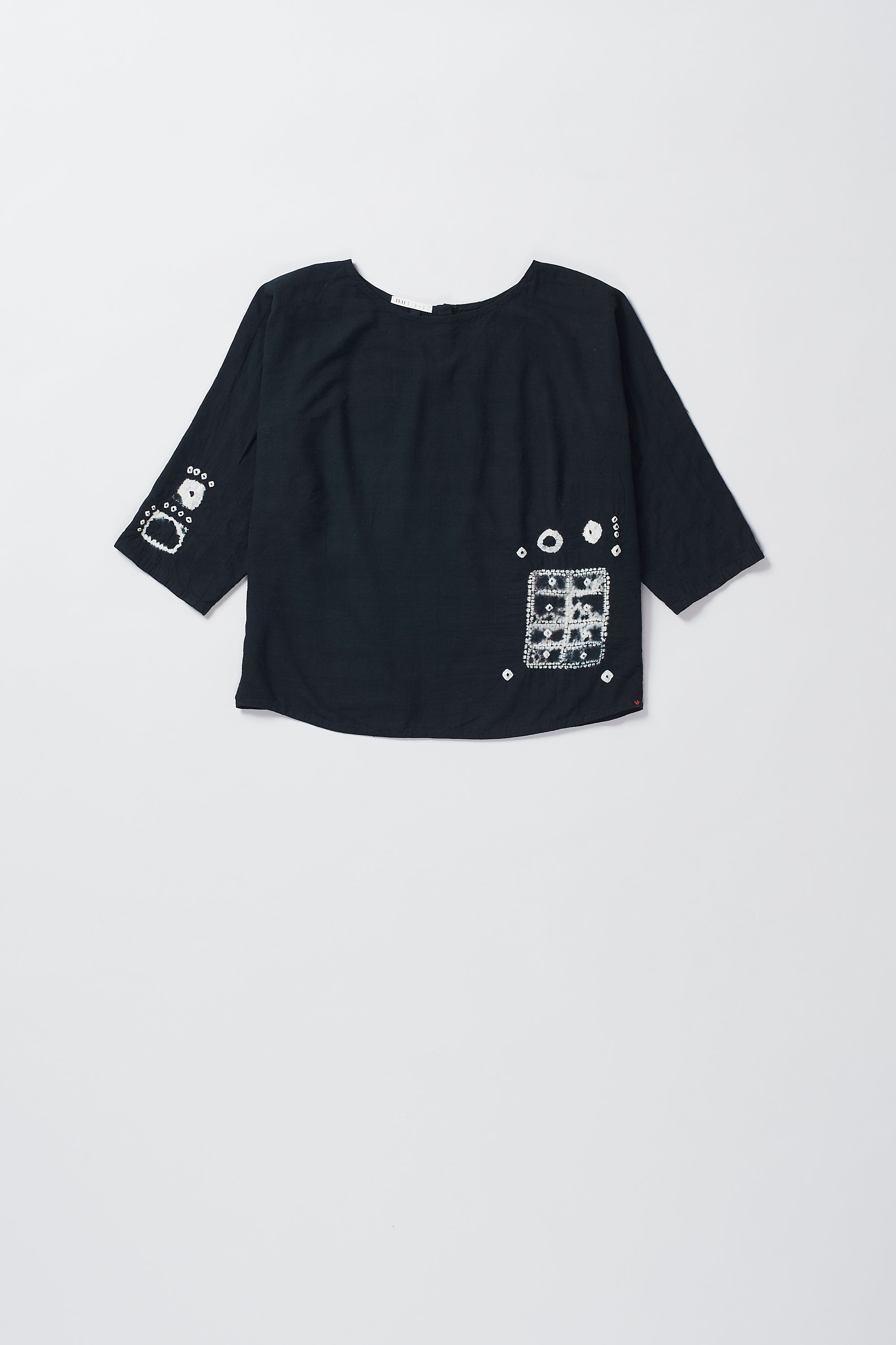 Front image of a black top