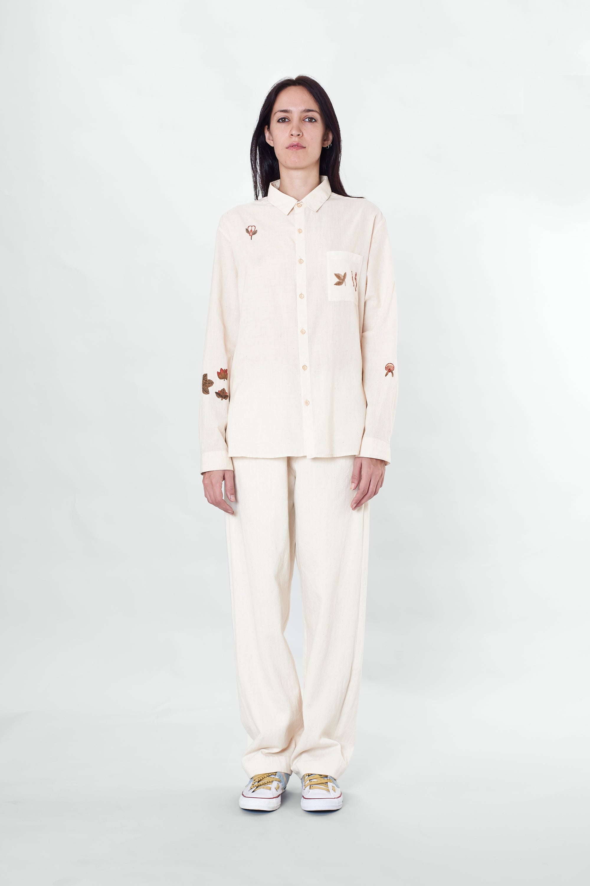 A man wearing ecru cotton shirt
