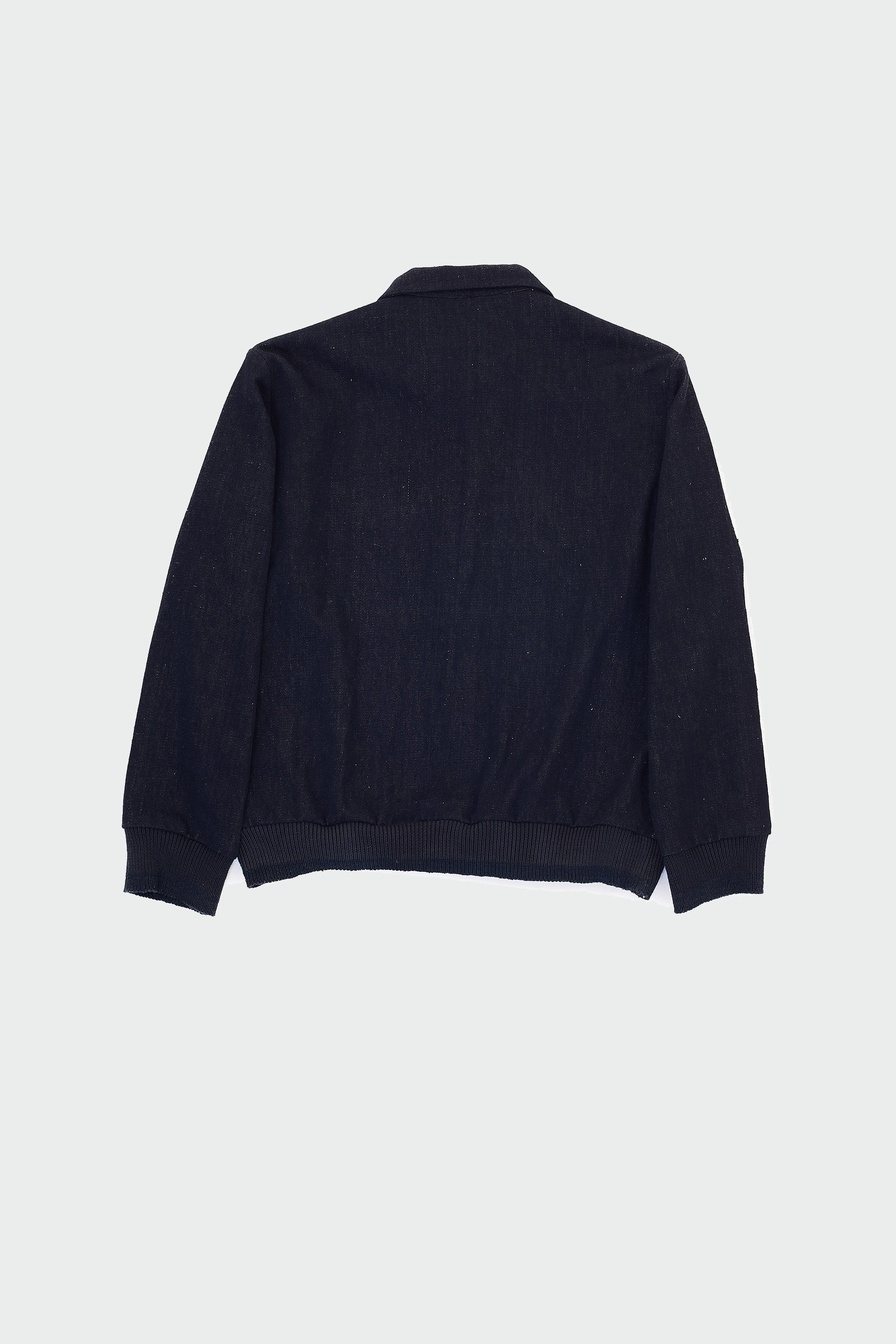 Back shot of midnight indigo jacket on a grey background
