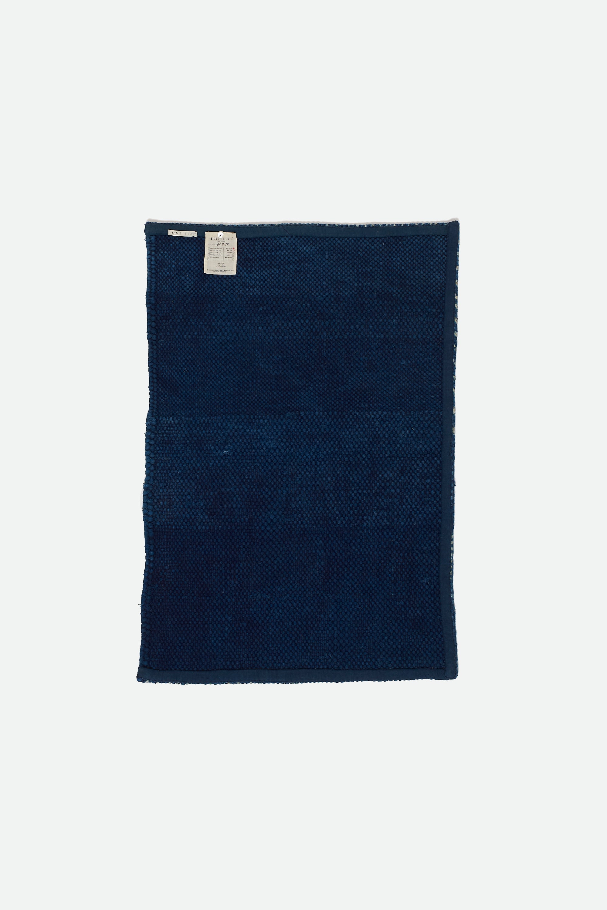 Back image of a cotton rug in sage 