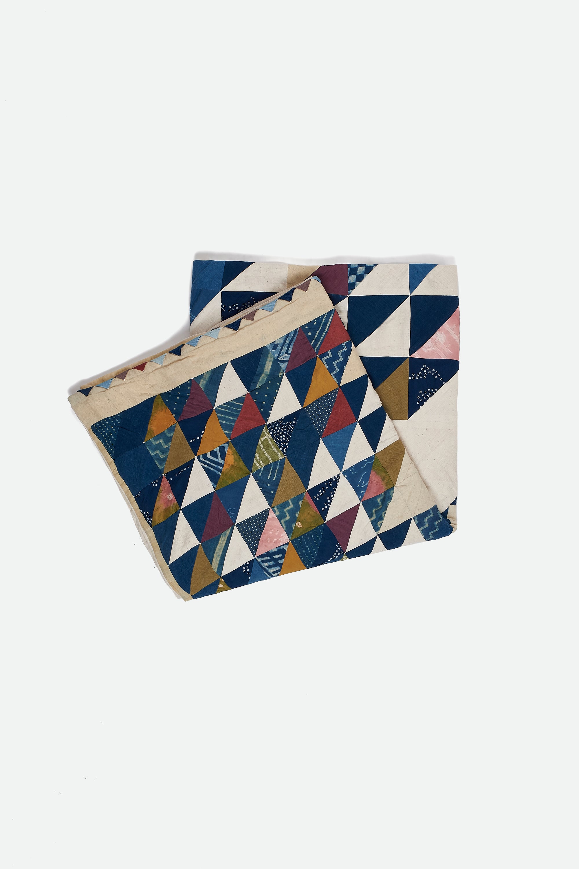 Colorful geometric-patterned fabric on a white background