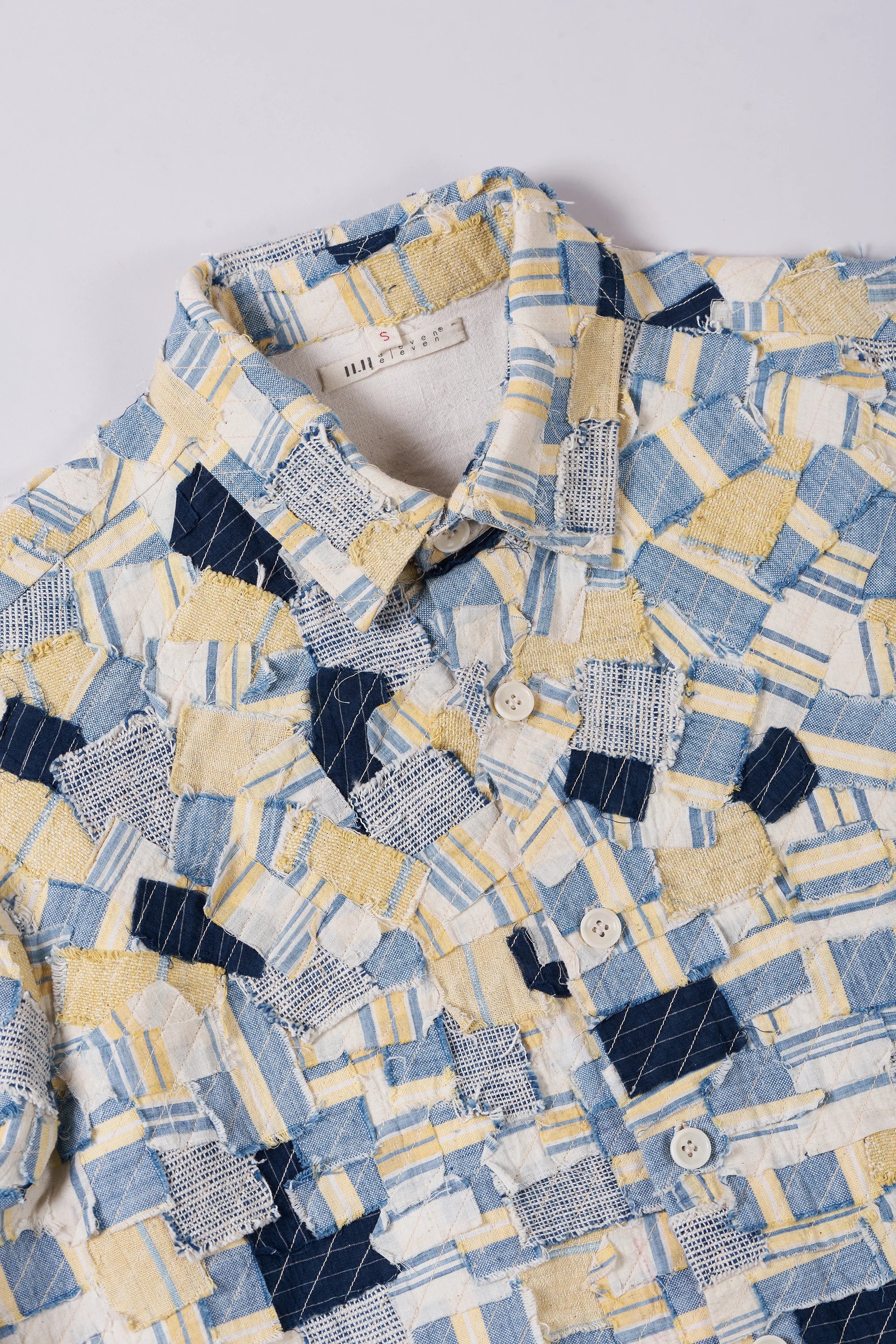 Fabric close-up with collar and buttons